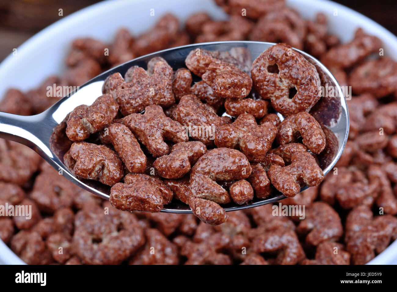 Cocoa cereals in a spoon closeup Stock Photo Alamy