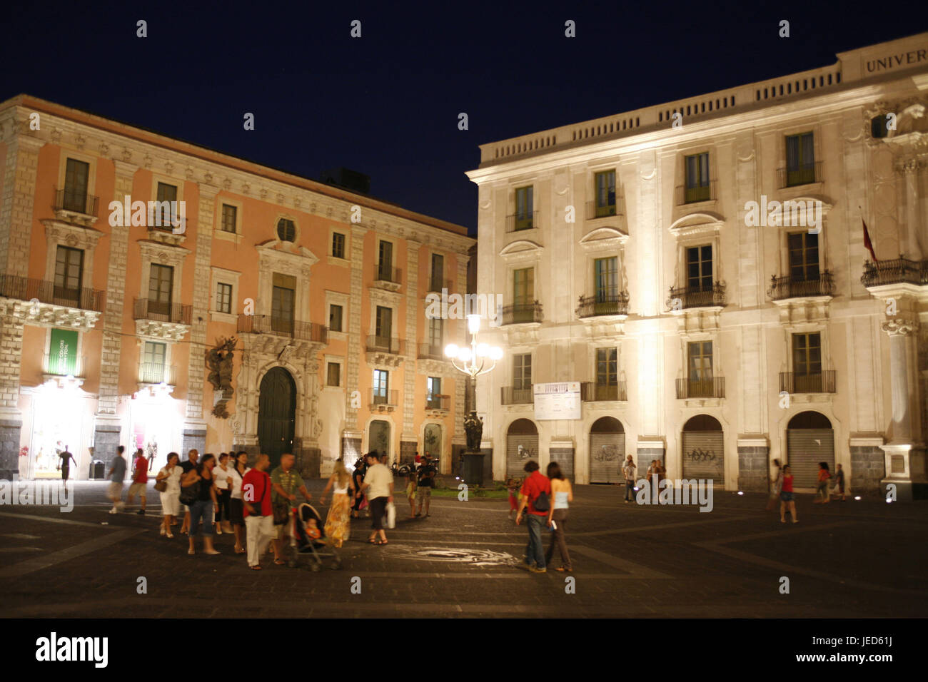 Italy, Sicily, Catania, Piazza Universita, Palazzo San Giuliano, tourist, evening, Southern Europe, island, town, houses, buildings, structures, architecture, places of interest, people, Stock Photo
