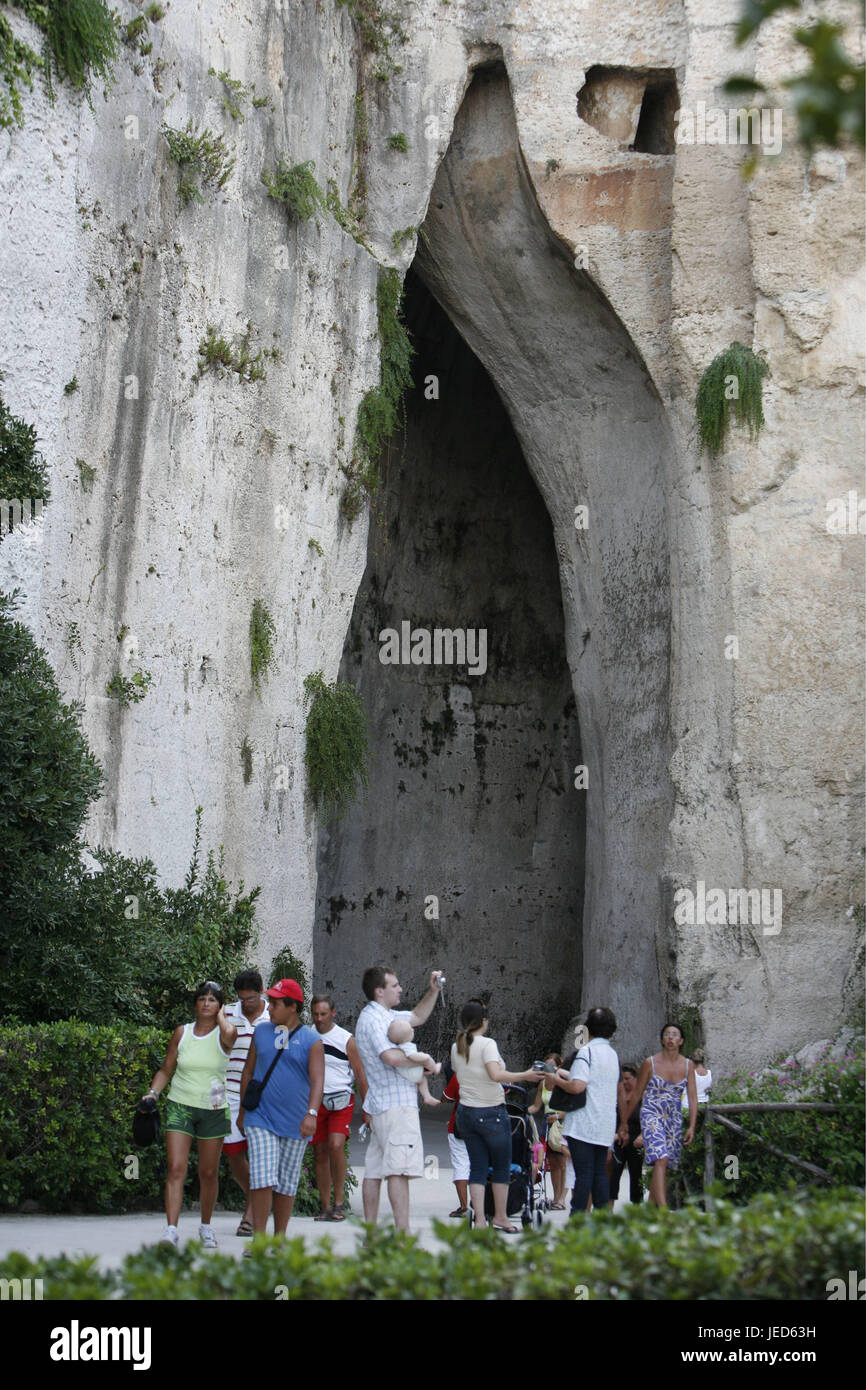 Italy, Sicily, island Ortygia, Syracuse, archaeological park, grotto Orecchio Tu Dionisio, tourist, Southern Europe, Siracusa, rock, cliff face, grotto, pit, input, grotto input, person, place of interest, destination, tourism, Stock Photo
