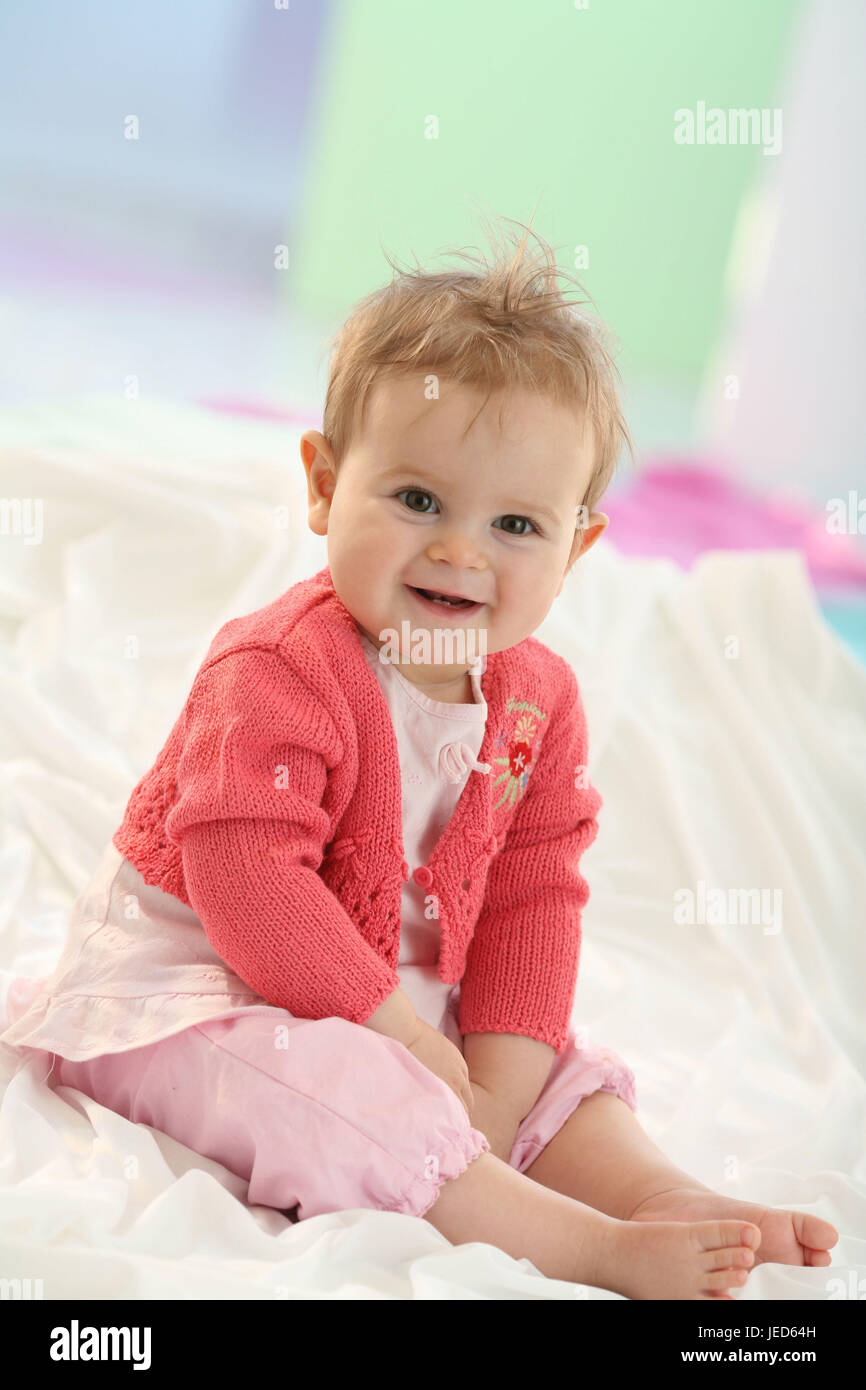 Baby, 6 months, portrait, seated, Stock Photo
