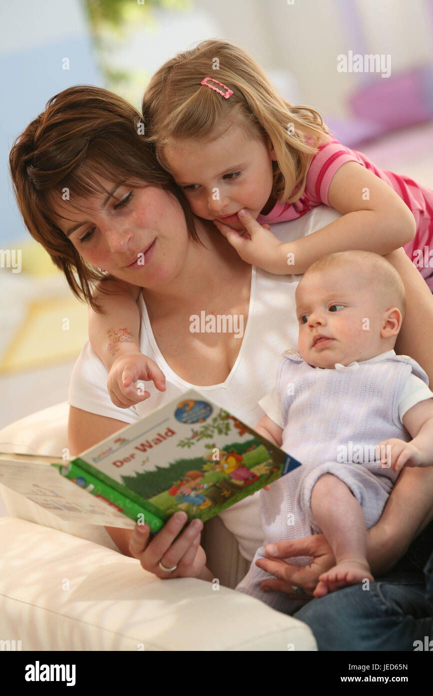Family, mother, baby, 3 months, infant, 3 years, book, read, Stock Photo