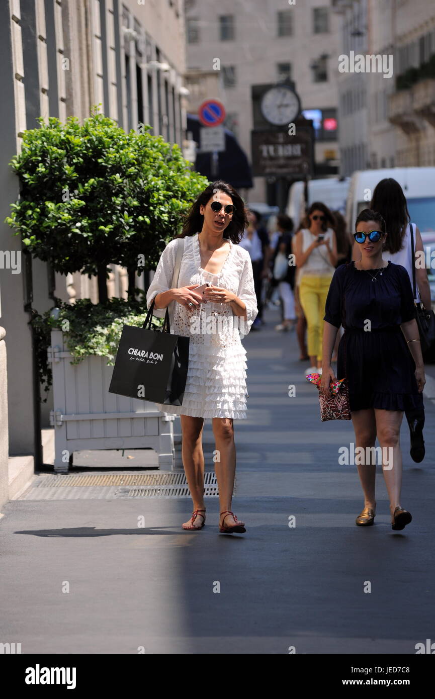 Milan, Moran Atias walking in the center The Israeli model and actress MORAN ATIAS strolls through the center streets in a torrid afternoon. Here he is with a friend in Montenapoleone Street, then meets with two other friends and they all go to lunch at a famous restaurant. Stock Photo