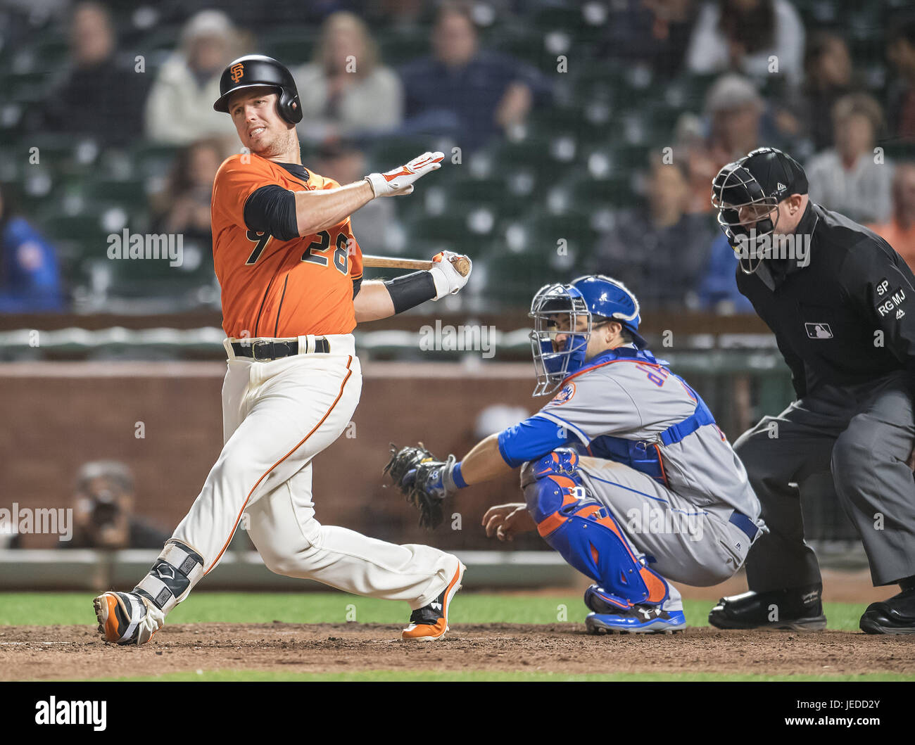 San Francisco, California, USA. 23rd June, 2017. Pinch hitting in the ninth inning, San Francisco Giants catcher Buster Posey (28) flied out to the warning track, during a MLB baseball game between the New York Mets and the San Francisco Giants on ''Orange Friday'' at AT&T Park in San Francisco, California. Valerie Shoaps/CSM/Alamy Live News Stock Photo