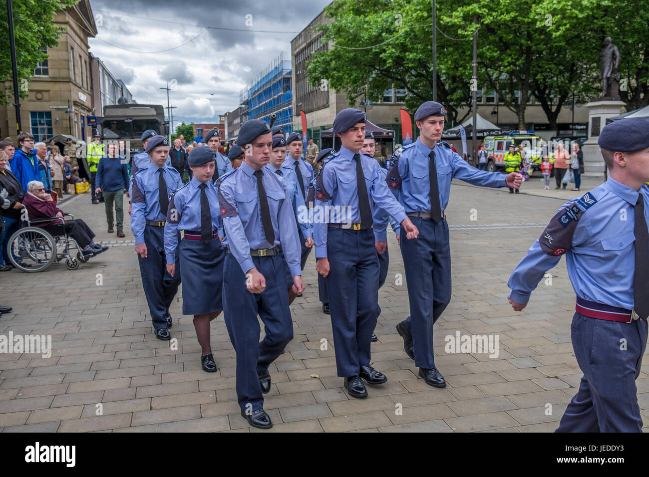 Bolton, Greater Manchester, England, UK 24th June 2017. Armed Forces Day celebrated in Bolton Town Centre with three of the forces present, Army Navy and Airforce,  The navy raised the standard just before 11:00 hours.  The groups all martched into position awaiting the arrival of the Vicar of Bolton, Bolton Mayor and other dignitaries, they all stood on the town hall steps where the vicar of Bolton conducted a small service in commemoration of the lives lost in various conflicts around the world. Credit: Mike Hesp/Alamy Live News Stock Photo