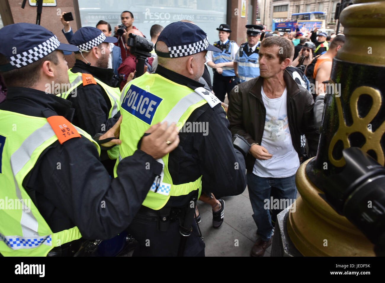Westminster, London, UK. 24th June, 2017. UAF demonstrators. The EDL march in central London is heavily policed against a counter demo by the UAF. Credit: Matthew Chattle/Alamy Live News Stock Photo