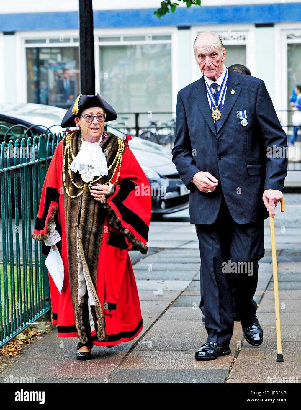 Brighton, UK. 24th June, 2017. The Mayor of Brighton and Hove Cllr Mo Marsh arrives with Dudley Button the President of Brighton and Hove British Legion for An Act of Remembrance for Armed Forces Day is held at the Brighton War memorial in the Old Steine organised by the Royal British Legion Credit: Simon Dack/Alamy Live News Stock Photo