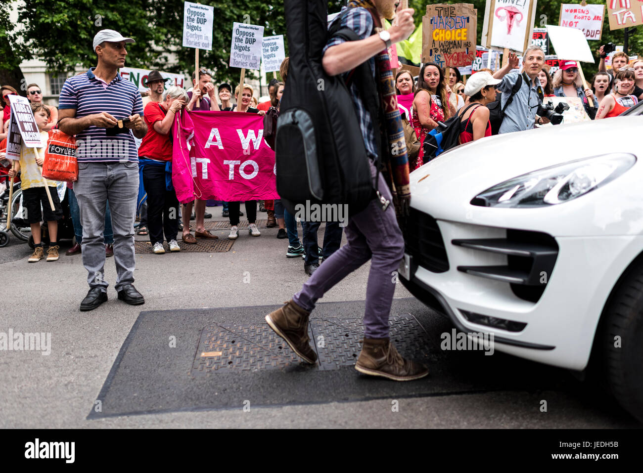 London, UK, 24th June 2017. Young people protest in front of Downing Street against the Tory government which is trying to create an alliance with the DUP. Credit: onebluelight.com/Alamy Live News Stock Photo