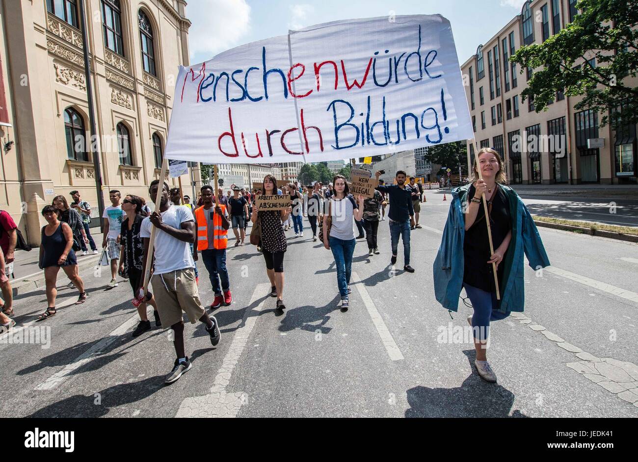 Munich, Germany. 24th June, 2017. As part of a Bavaria-wide action, as well as other cities throughout Germany participating, well over 3,000 citizens, politicians, and refugee group volunteers in Munich organized a demonstration and subsequent march to the Staatskanzlei of Bavaria in protest of the resuming of refugee deportations into war zones. After a botched arrest and deportation of an Afghan refugee from a classroom in Nuremburg and a bombing of the Diplomatic Quarter of Kabul, Germany temporarily suspended deportations until a review of Afghanistan was complete. Credit: ZUMA Press, Inc Stock Photo