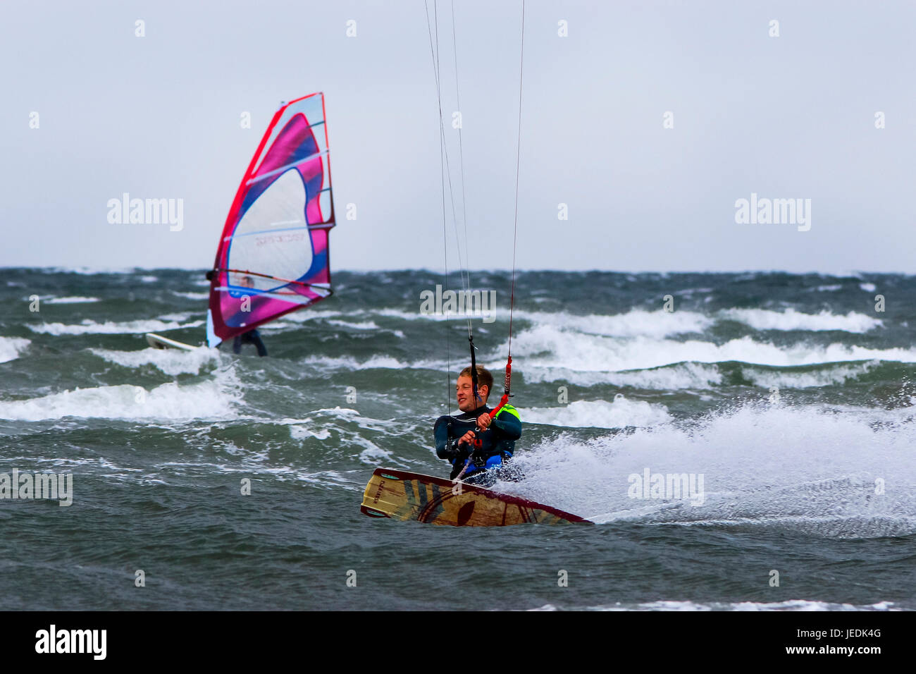 Troon, UK. 24th June, 2017. Strong winds and high waves on the Firth of Clyde at Troon, Ayrshire,  provides the perfect conditions for watersports for some. Credit: Findlay/Alamy Live News Stock Photo