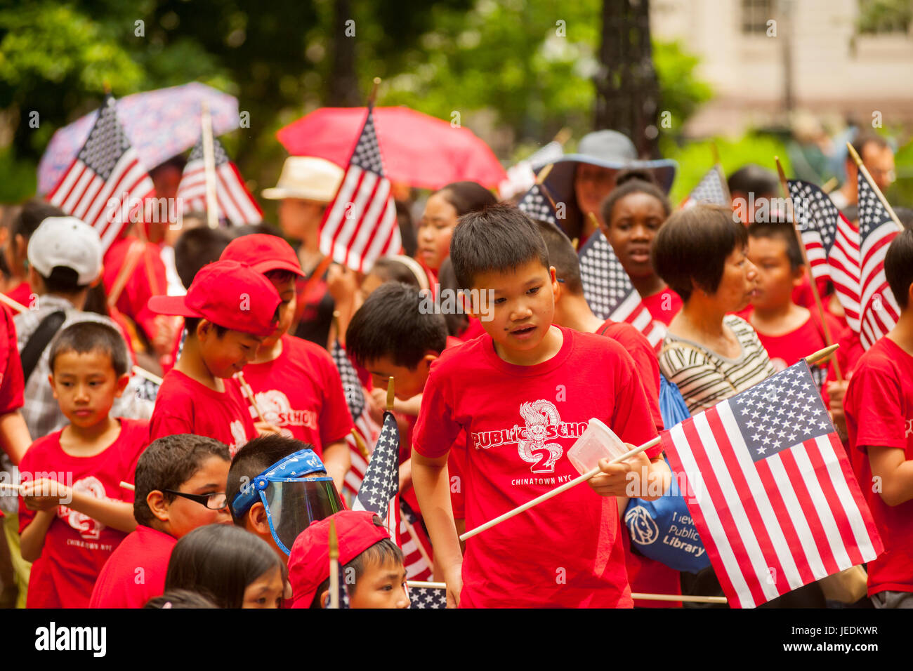 Students from PS 2 prepare to march in the annual Flag Day Parade in New York on Wednesday, June 14, 2017, starting at New York City Hall Park.  Flag Day was created by proclamation by President Woodrow Wilson on June 14, 1916 as a holiday honoring America's flag but it was not until 1949 when it became National Flag Day.  The holiday honors the 1777 Flag Resolution where the stars and stripes were officially adopted as the flag of the United States. (© Richard B. Levine) Stock Photo