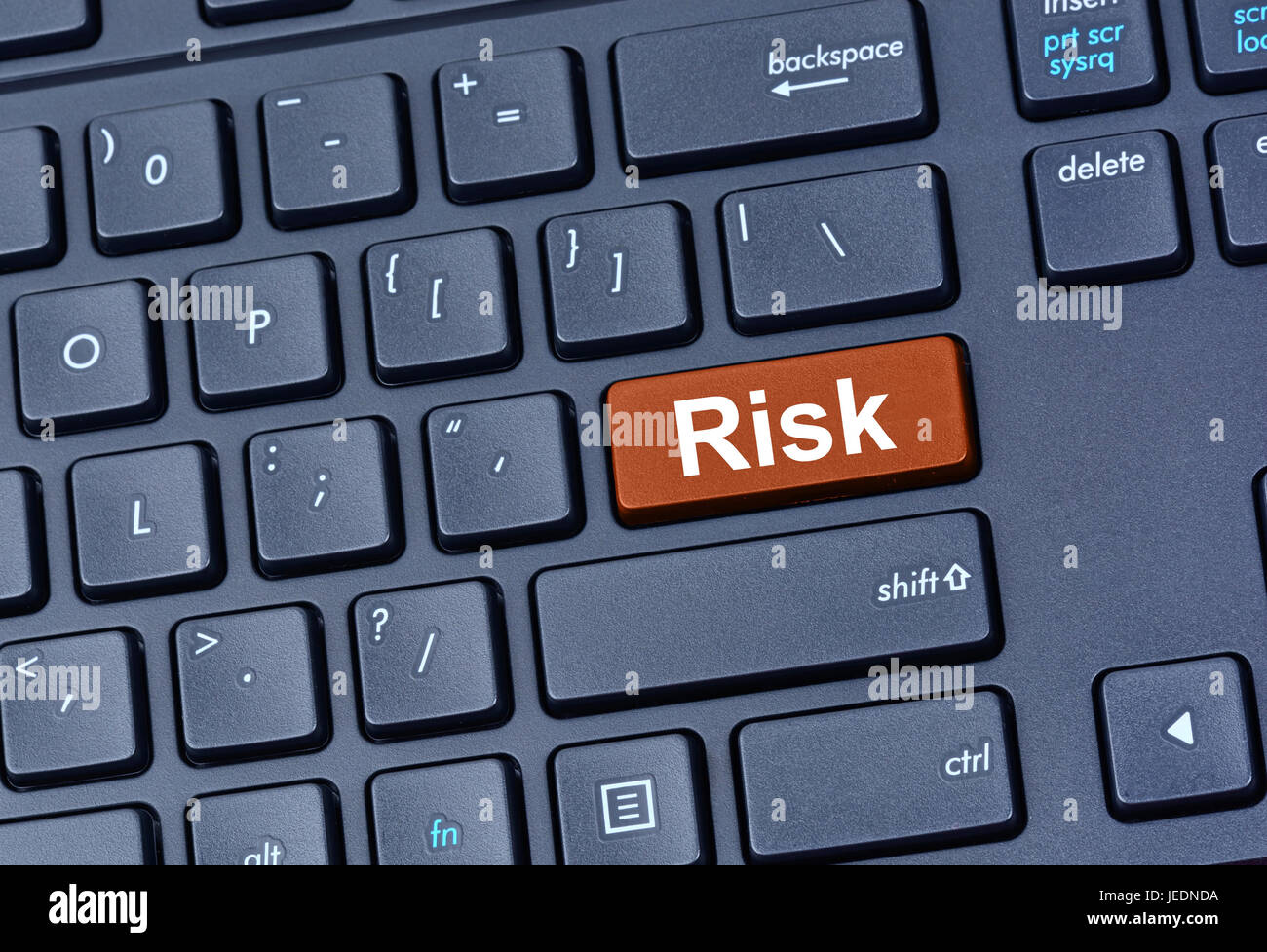 Risk button on computer keyboard hi-res stock photography and images ...