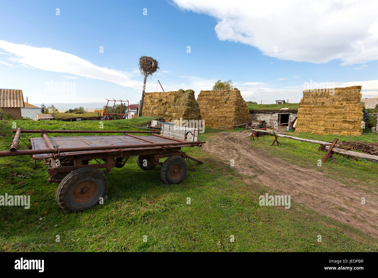Haystack and agricultural scene in village Bokdajeni, Georgia, Caucasus. Stock Photo