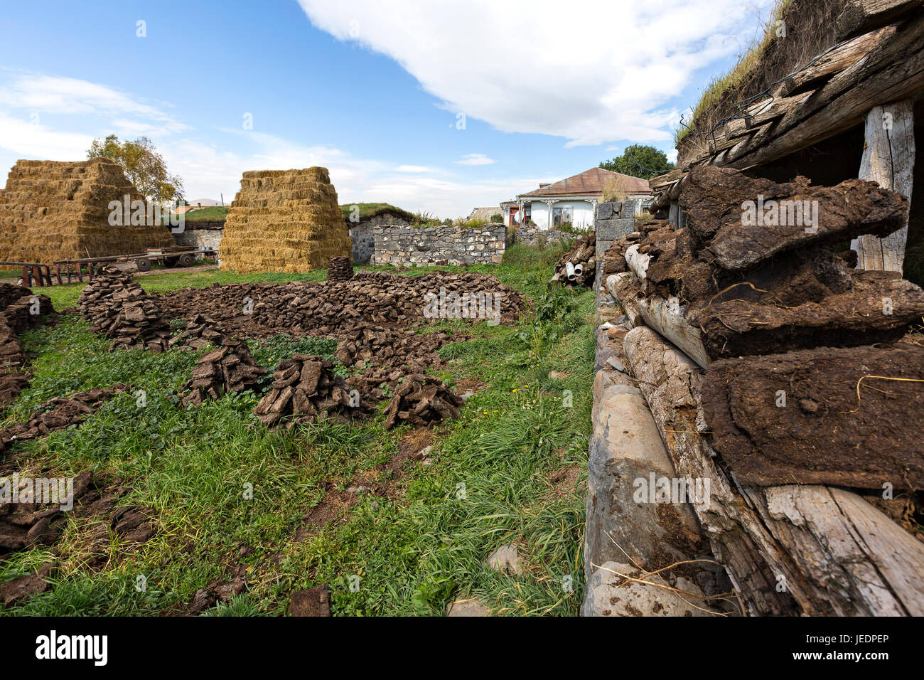 Haystack and agricultural scene in village Bokdajeni, Georgia, Caucasus. Stock Photo