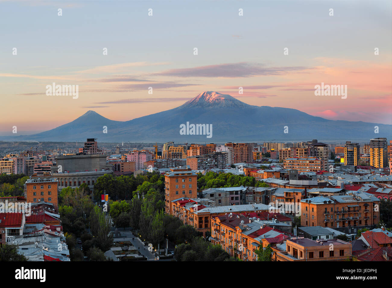View over Yerevan at the sunrise with the two peaks of the Mt Ararat in the background, Armenia. Stock Photo