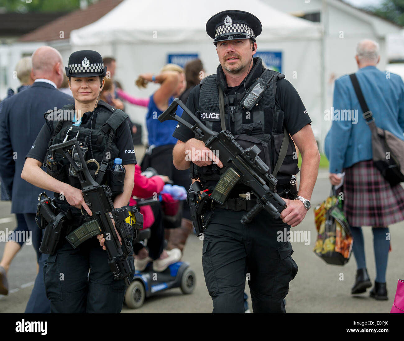 Armed police officers on patrol at the Royal Highland Show, Ingliston, Edinburgh. Stock Photo