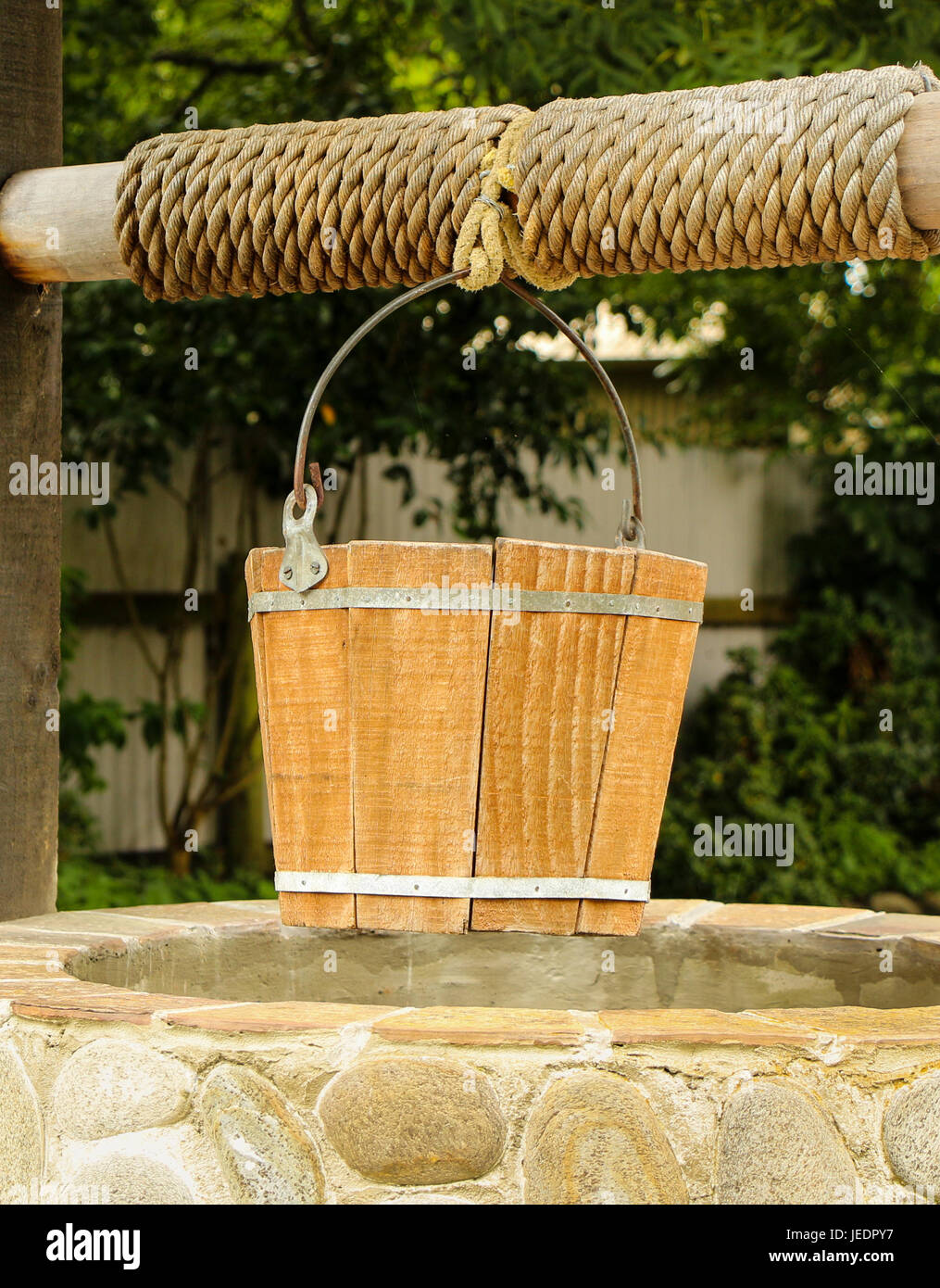 Nice wooden well bucket ready to use Stock Photo Alamy