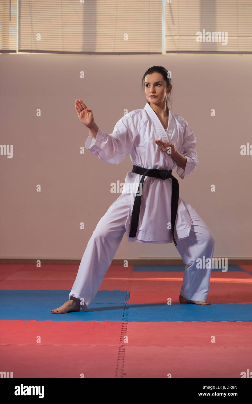 Young Woman Practicing Her Karate Moves - White Kimono - Black Belt Stock Photo - Alamy Young Woman Practicing Her Karate Moves - White Kimono - Black Belt Stock Photo - Alamy