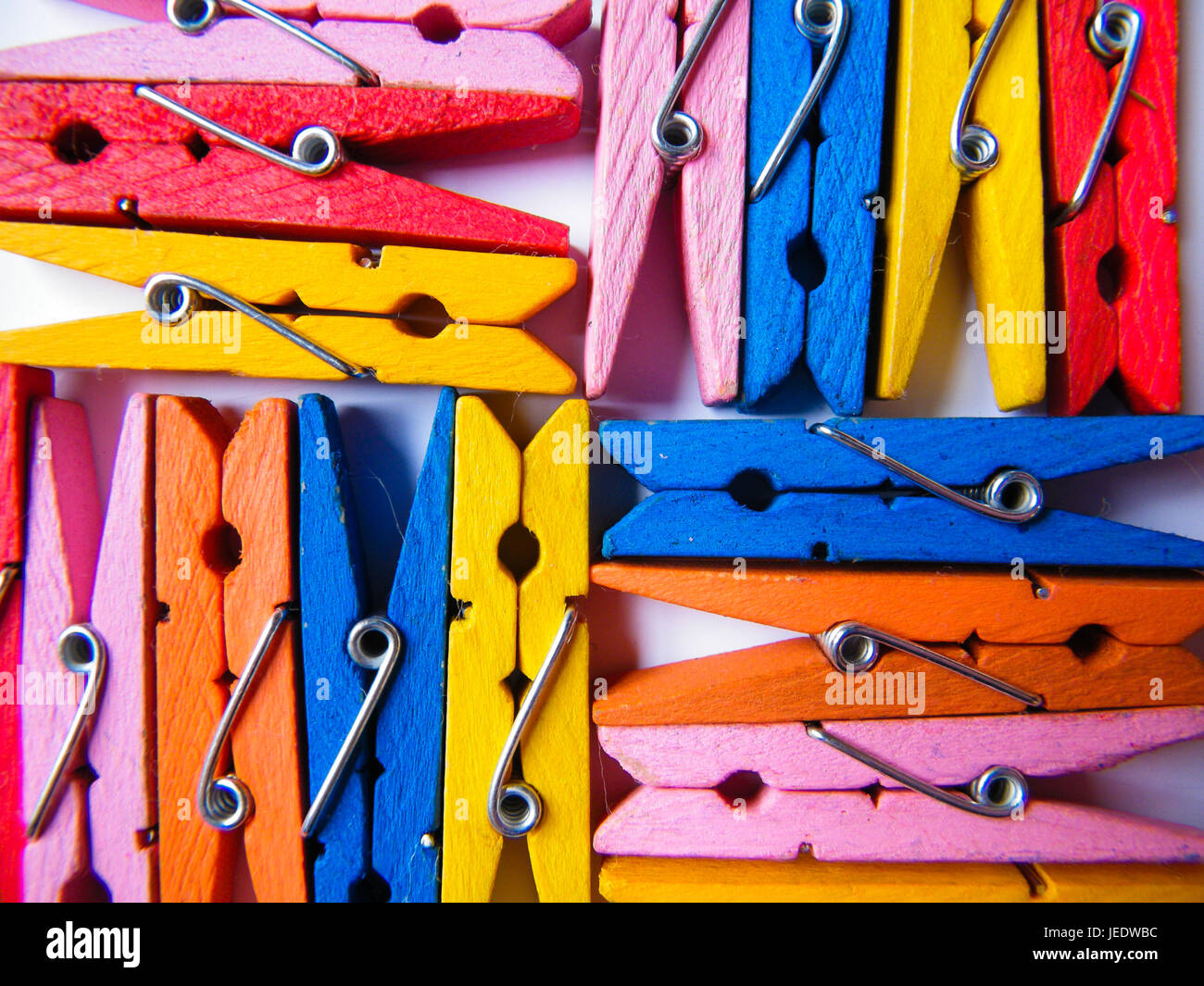 Wooden colorful pegs Stock Photo - Alamy