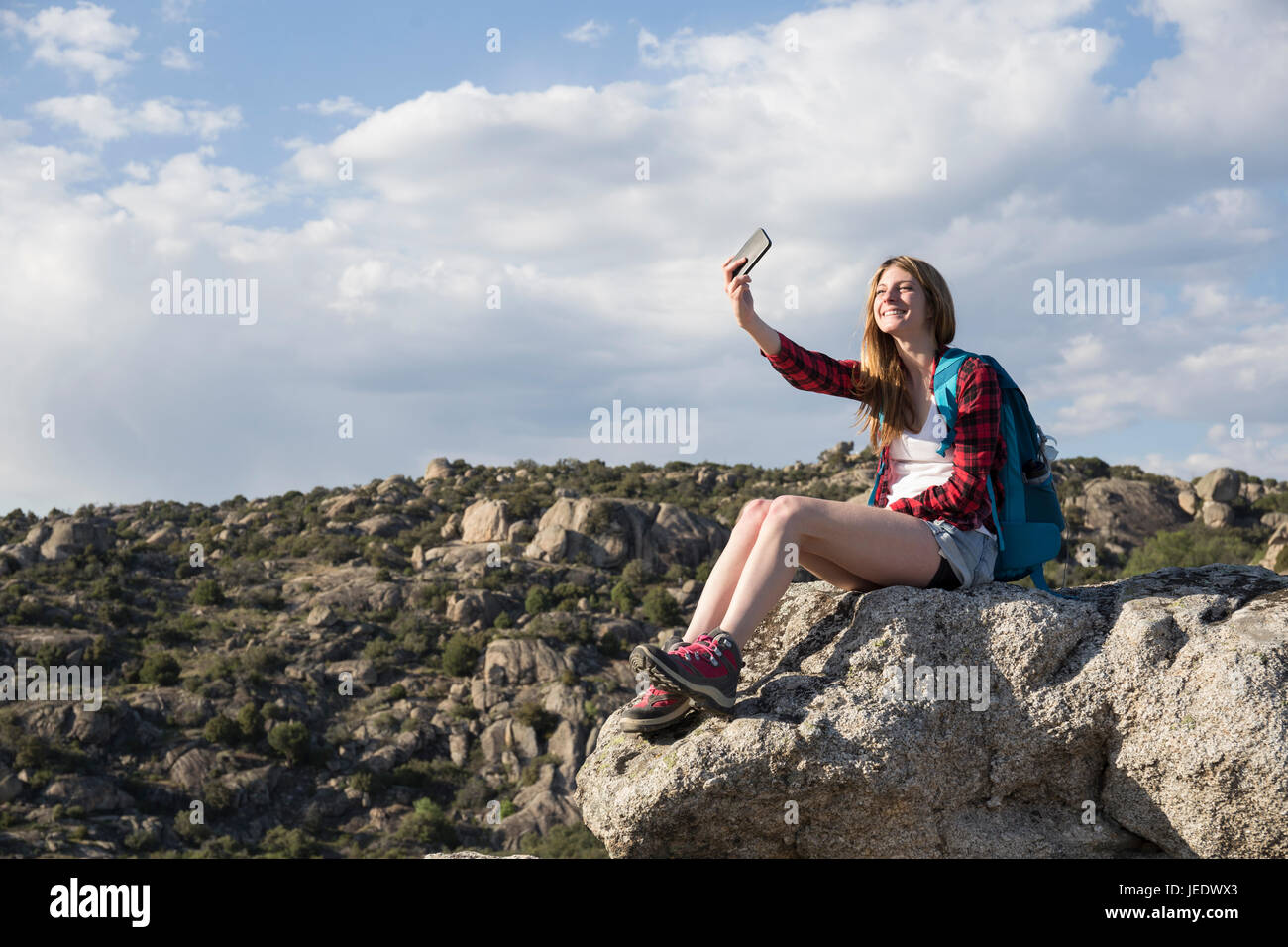 Cheerful female hiker taking selfie hi-res stock photography and images ...