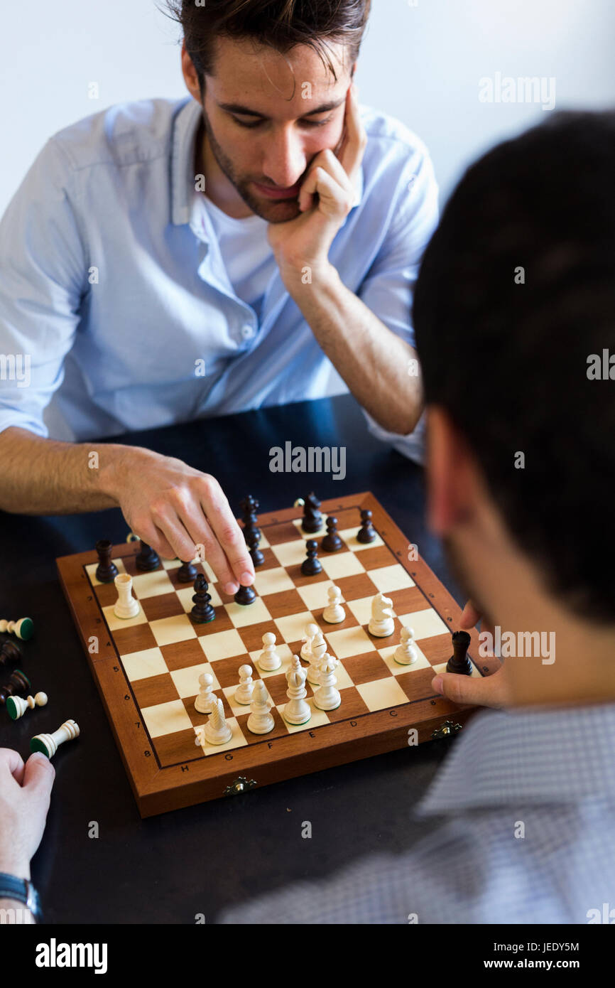 Two men playing chess Stock Photo Alamy