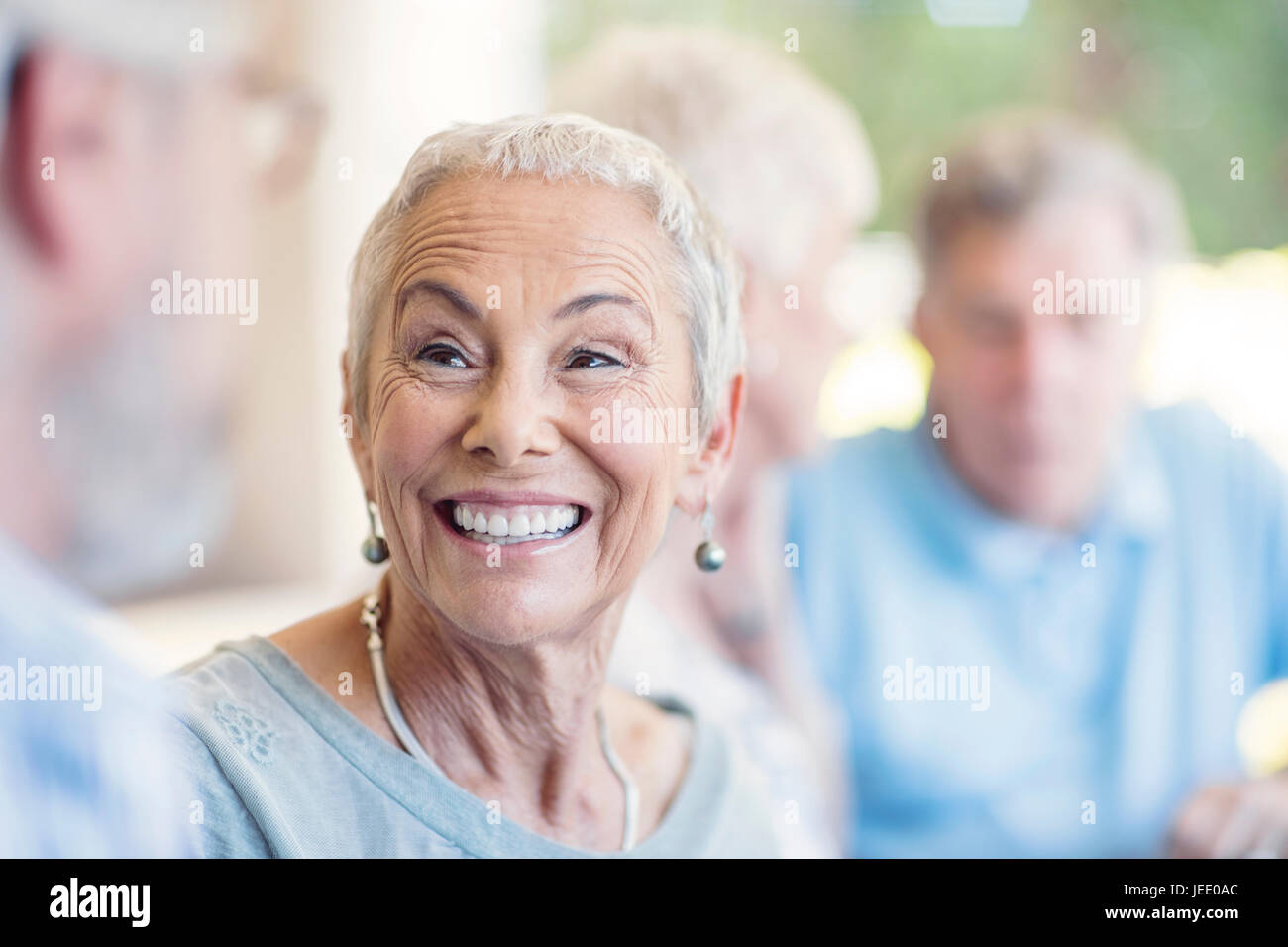 Portrait of smiling senior woman Stock Photo - Alamy