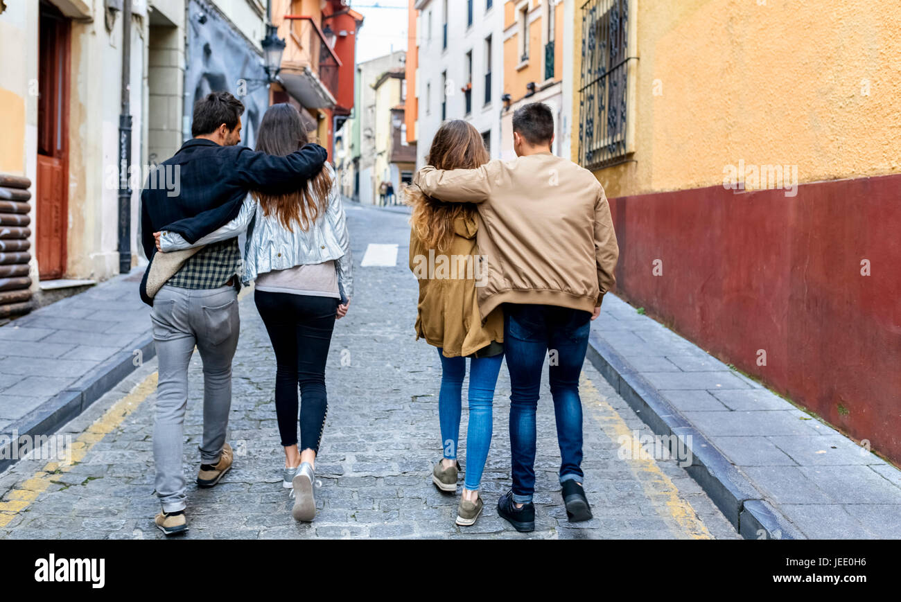 People strolling on cobblestone pavement hi-res stock photography and ...