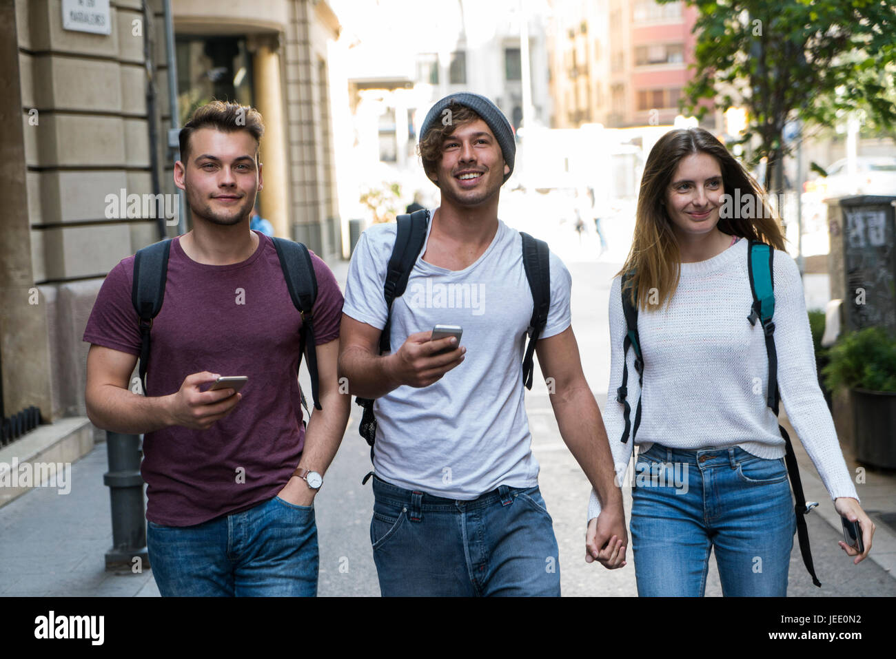 Group of hands holding cell phones hi-res stock photography and images ...