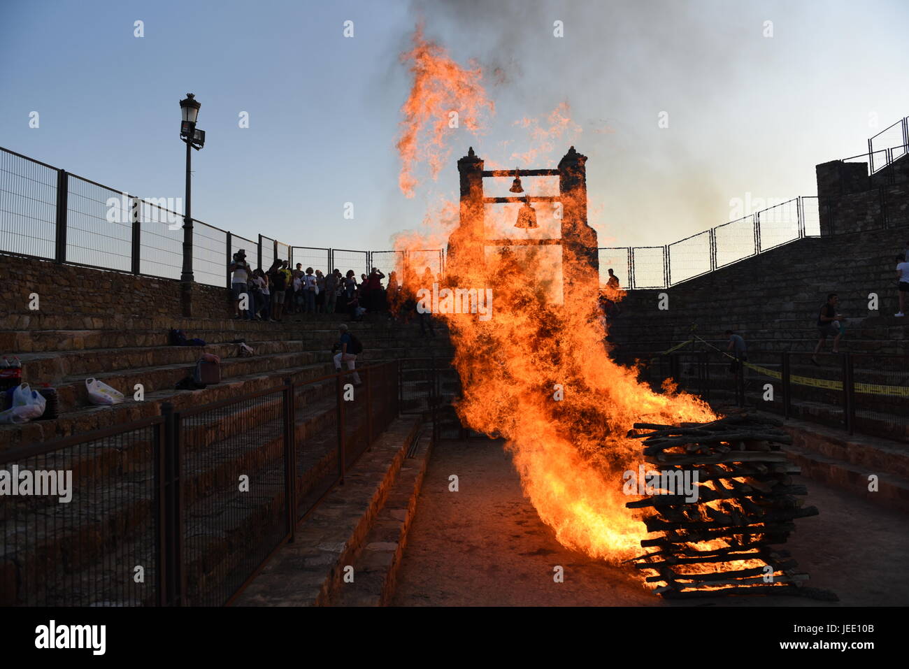 People view a fire before walking on the burning embers during the night of San Juan in San Pedro Manrique, northern Spain, (Photo byJorge Sanz/Pacific Press) Stock Photo