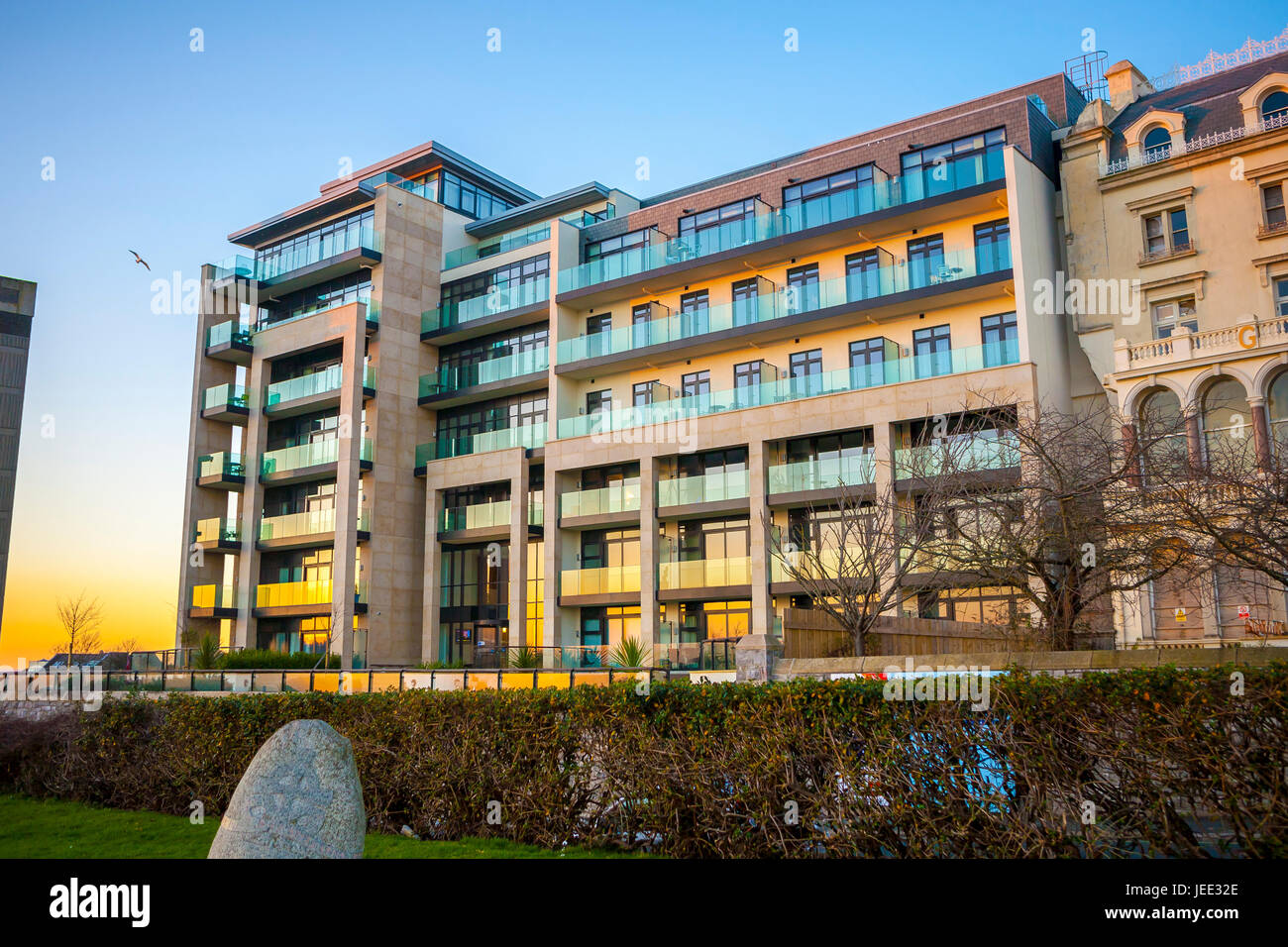 Azure flats, Plymouth Hoe in golden sunset, modern high quality