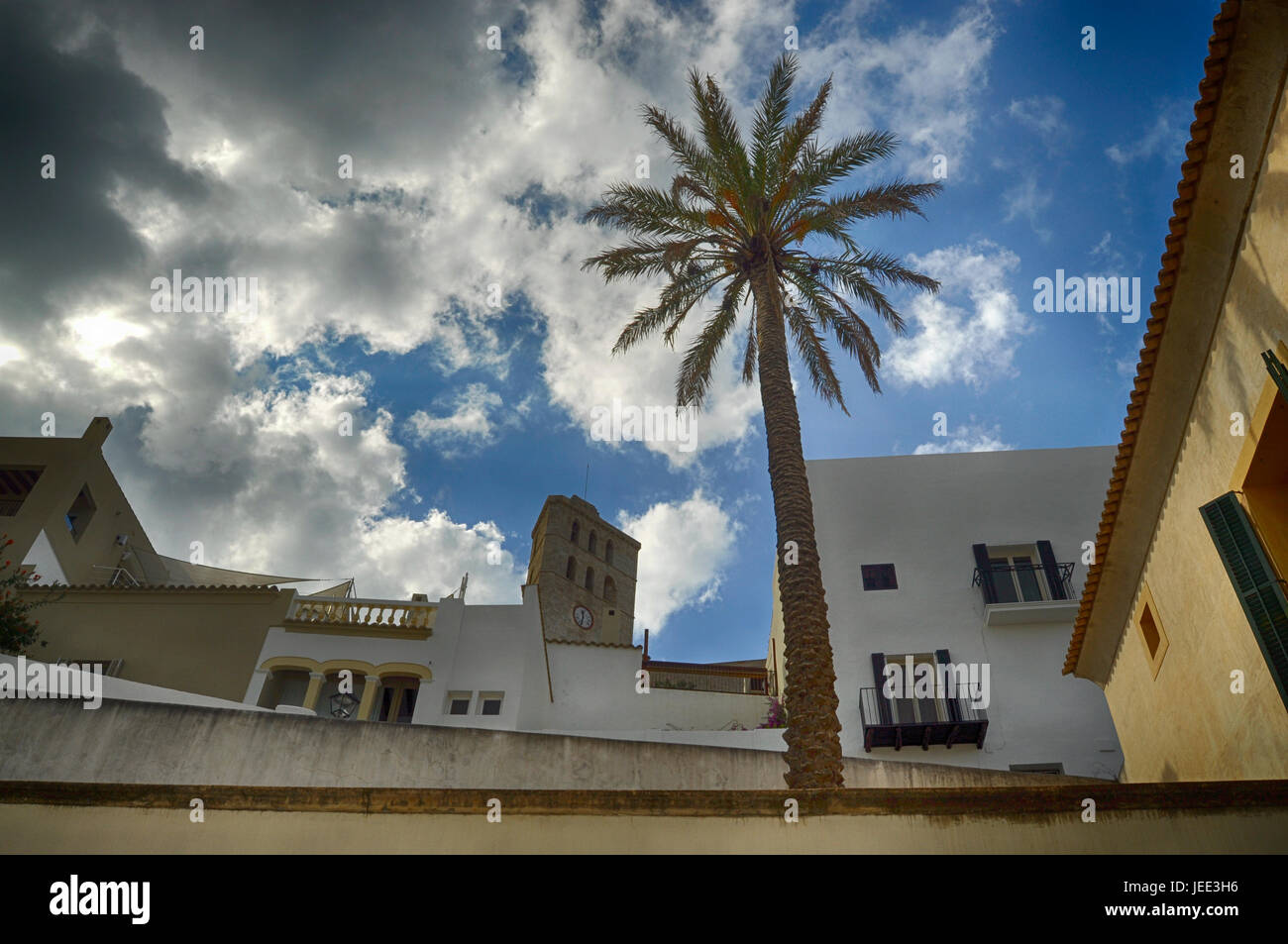 Bottom view of Ibiza houses and belfry Stock Photo