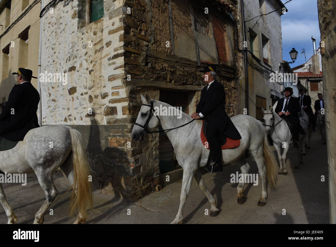 San Pedro Manrique, Spain. 24th June, 2017. A group of men, dressed in traditional costume, ride horses during the celebration of the ancient tradition of 'La Descubierta' in San Pedro Manrique, northern Spain. Credit: Jorge Sanz/Pacific Press/Alamy Live News Stock Photo