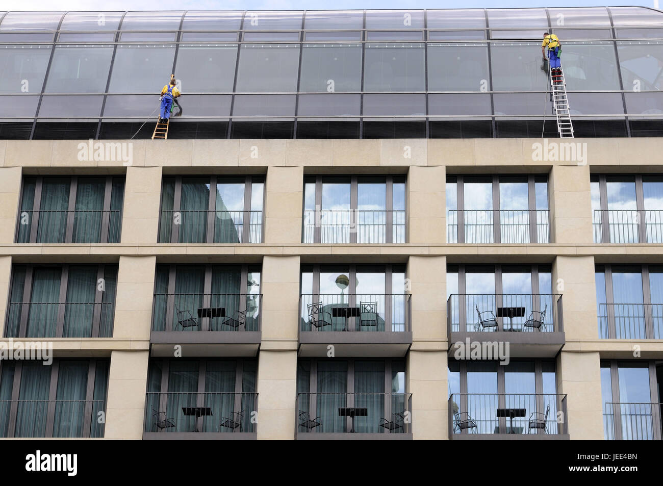 Window Cleaner In Building Window-cleaner, building, roof, facade Stock Photo - Alamy