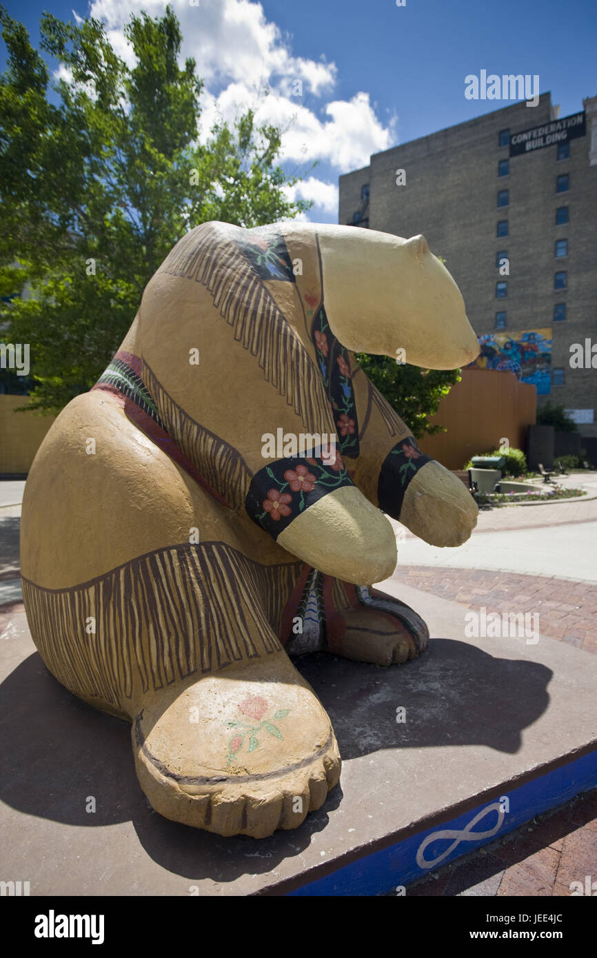 Canada, Manitoba, Winnipeg, Exchange District, sculpture, polar bear, Indian's clothes, Stock Photo