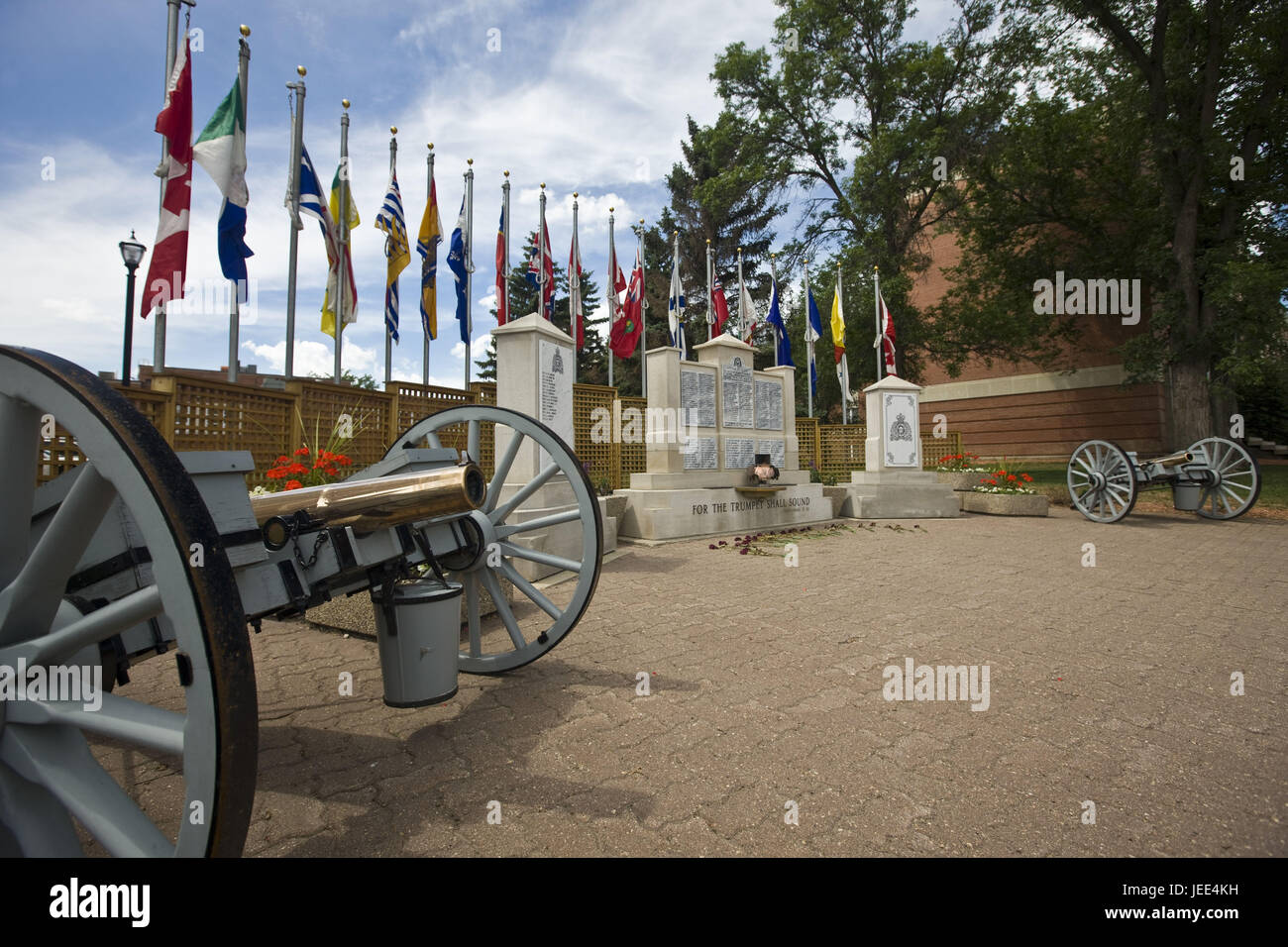 Canada, Saskatchewan, Regina, Academy RCMP, Memorial monument, cannons, flags, Stock Photo