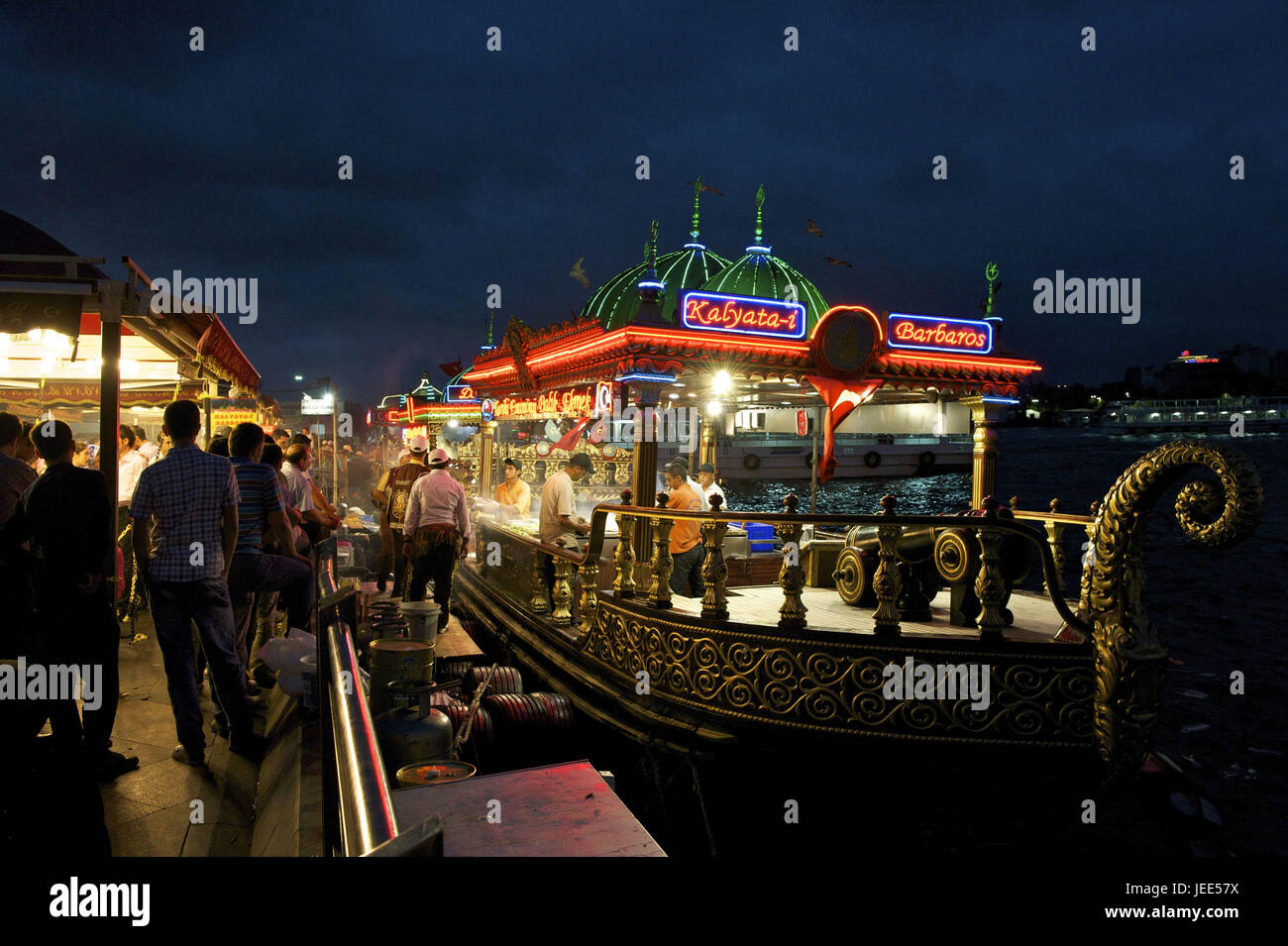 Turkey, Istanbul, part of town of Eminou, fish restaurants in the Golden Horn at night, Stock Photo