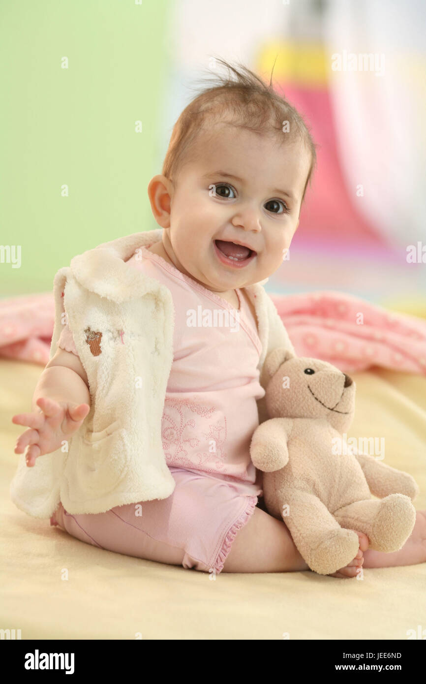 Baby, 8 months, sit, happily, view camera, soft animal, Stock Photo