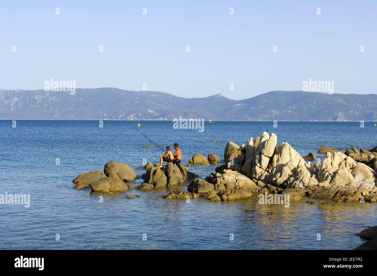 France, Corsica, Porto-Pollo, sea, rock, father, son, angling, Stock Photo