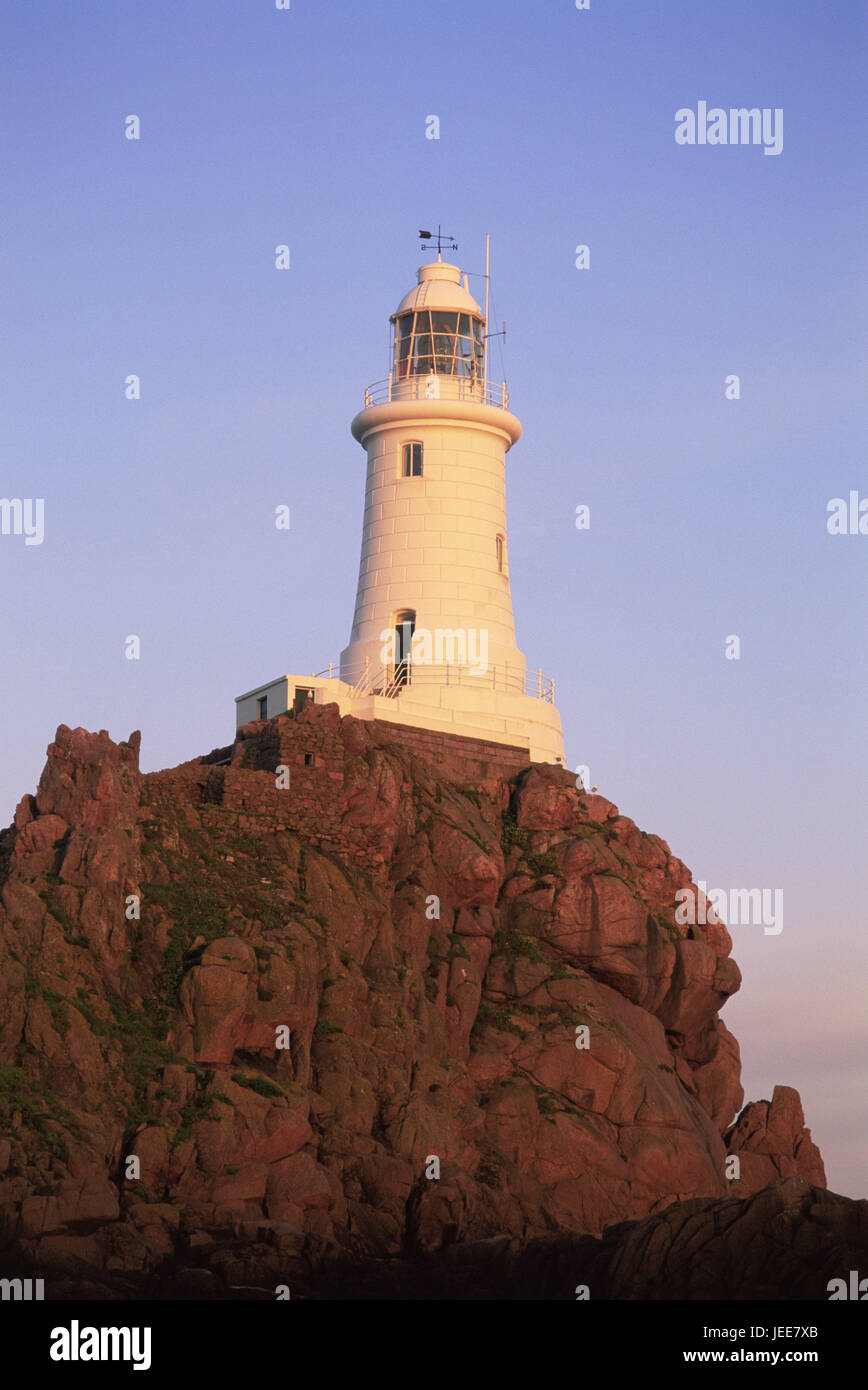 Great Britain, the Channel Islands, island Jersey, La Corbiere, lighthouse, daybreak, Europe, coast, rock, rocky, building, architecture, tower, beacon, sea character, orientation, guidance, navigation, navigation help, navigation, dusk, outside, deserted, Stock Photo