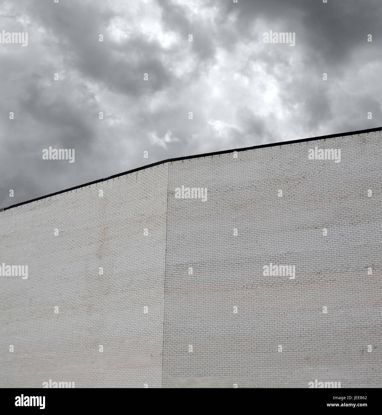 Conception, wall, white stones, cloudied day, Stock Photo