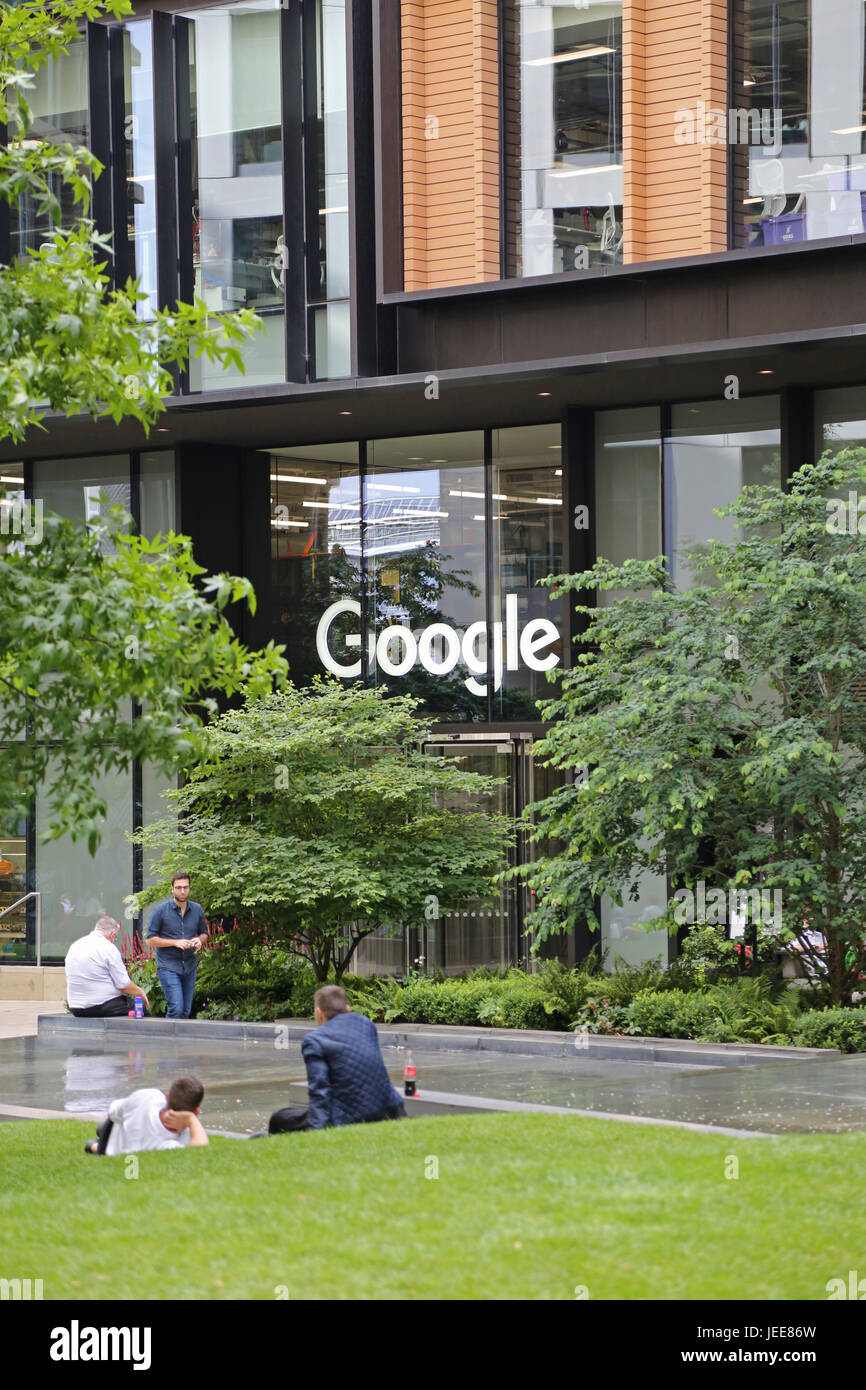 The entrance to Google's new UK headquarters building in St Pancras Square, London. Shows Google sign above door. Stock Photo