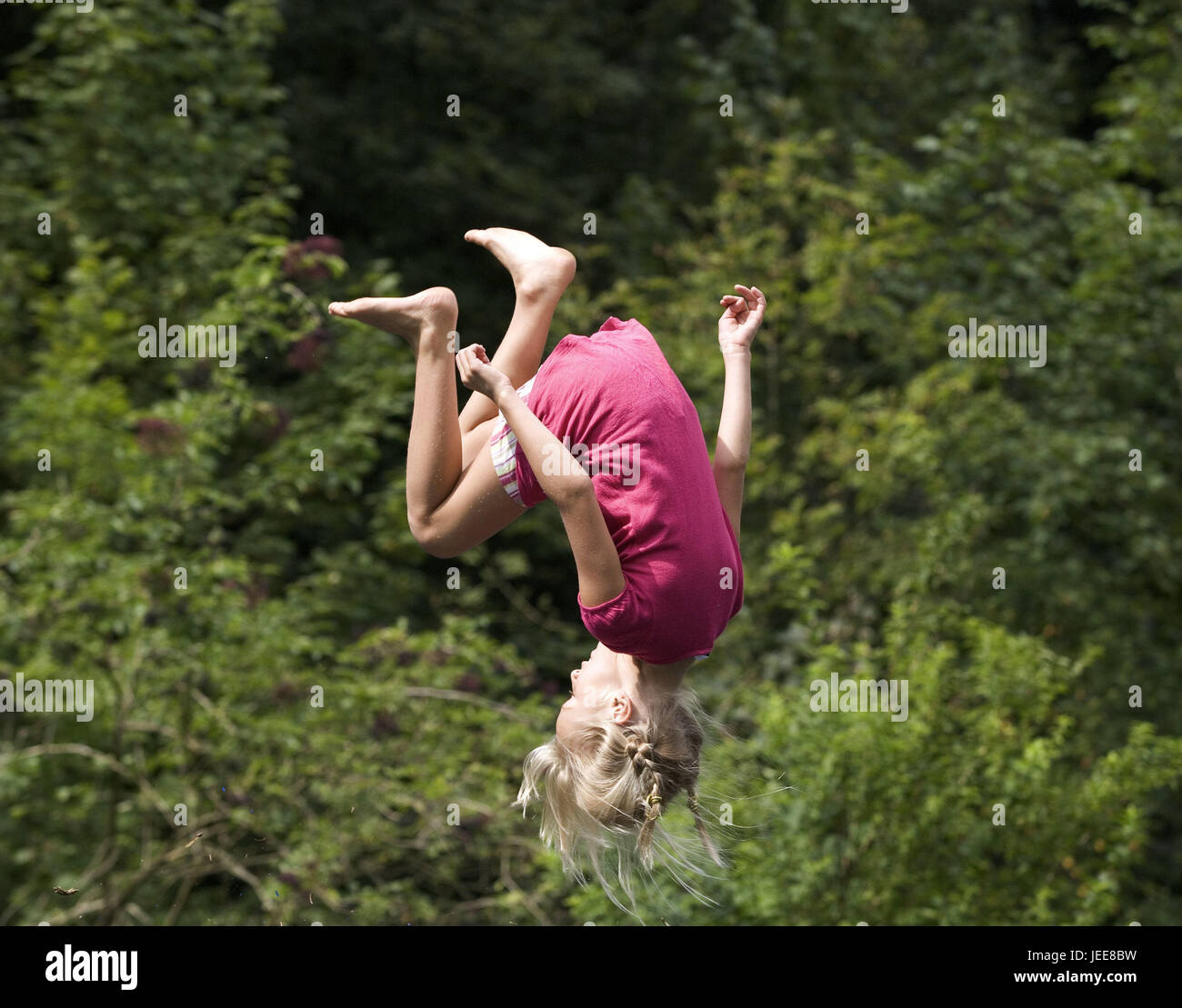 Girls, tram Pole's jumping, somersault, person, children, childhood, whole body, flight phase, headlong, long-haired, plaits, blond, motion, activity, leisure time, fun, gymnastics, tram Pole, somersault, talent, garden, outside, Stock Photo