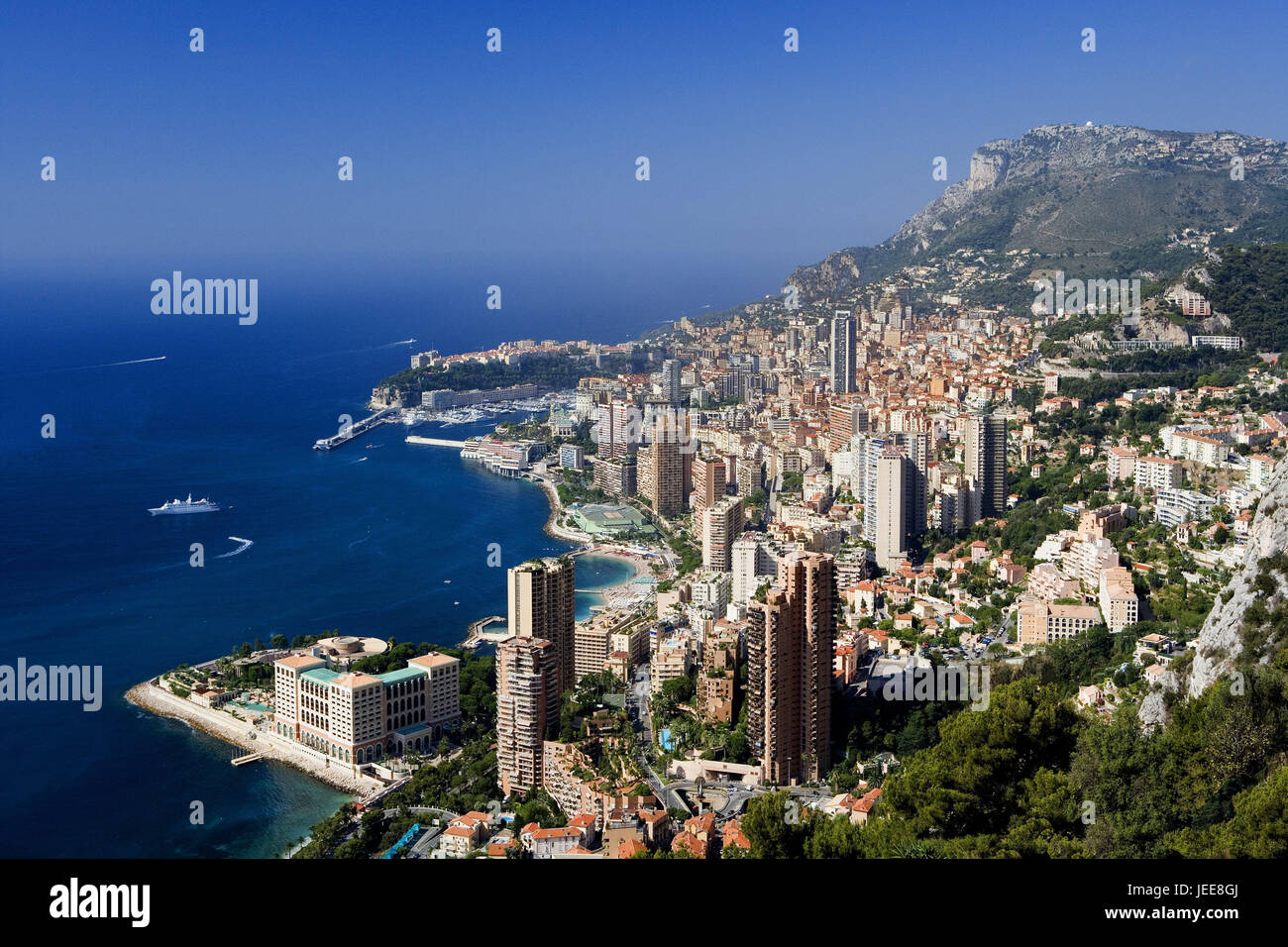 Monaco, Monte Carlo, town overview, the Mediterranean Sea, principality, Riviera, Mediterranean coast, houses, residential houses, high rises, hotels, harbour, destination, tourism, wealth, luxury, jet set, tax haven, Stock Photo