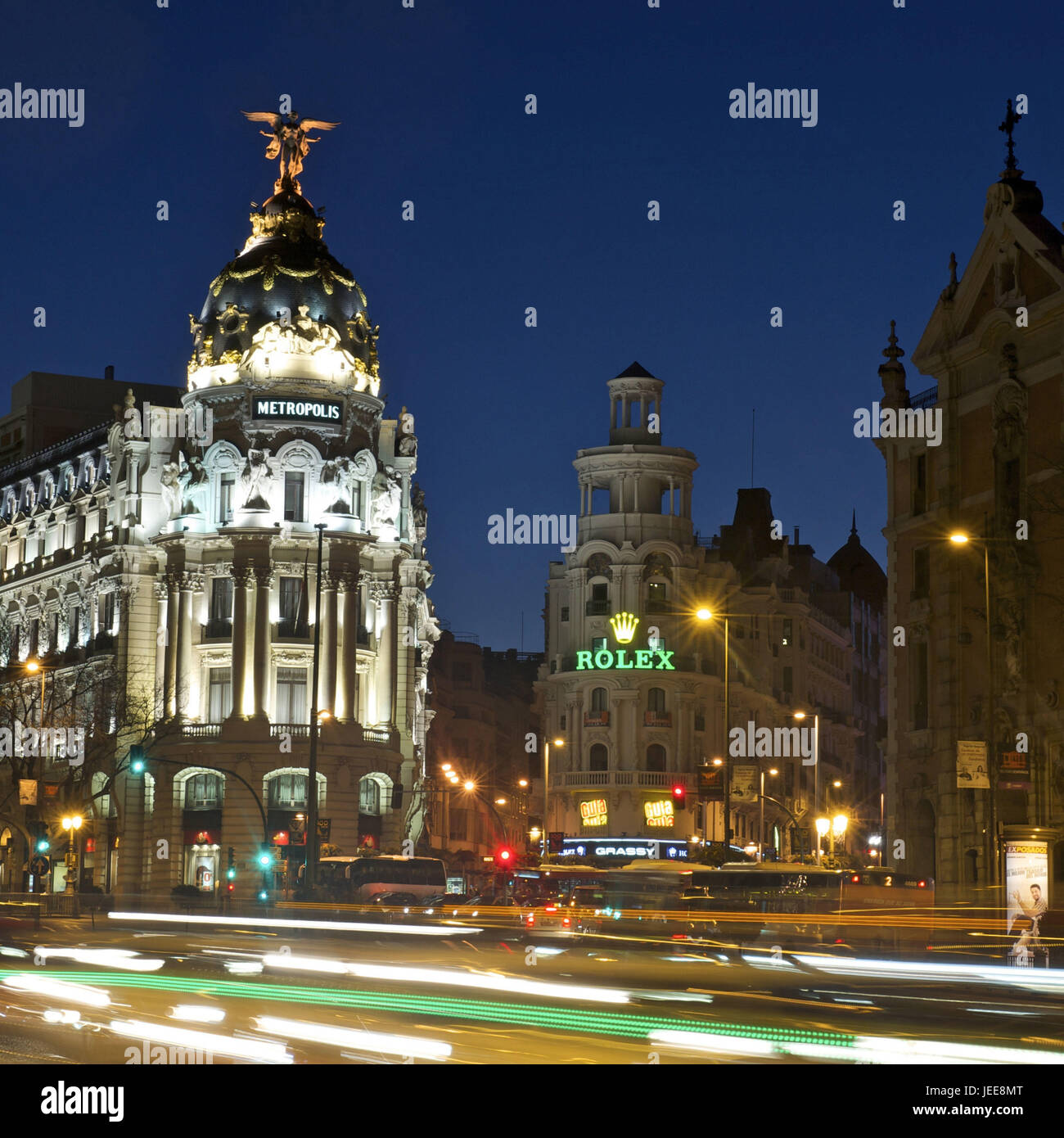 Spain, Madrid, Metropolis building at night, grain Via, motor traffic, Stock Photo