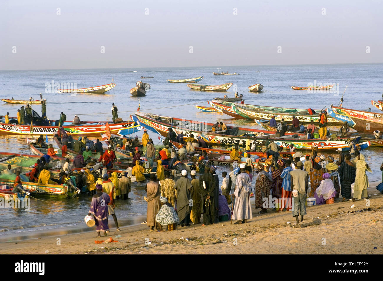 Sea, harbour, fishing boats, Pirogen, fishermen, M'Bour, Petite Cote, Senegal, Stock Photo