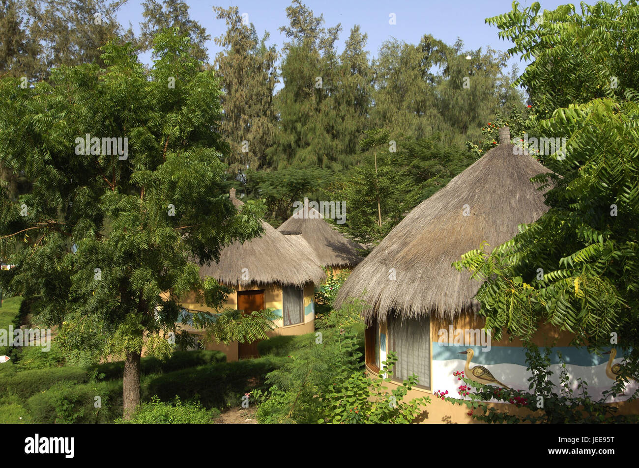 Bungalow attachment, trees, hotel of Domaine de Nianing, Petite Cote, Senegal, Stock Photo