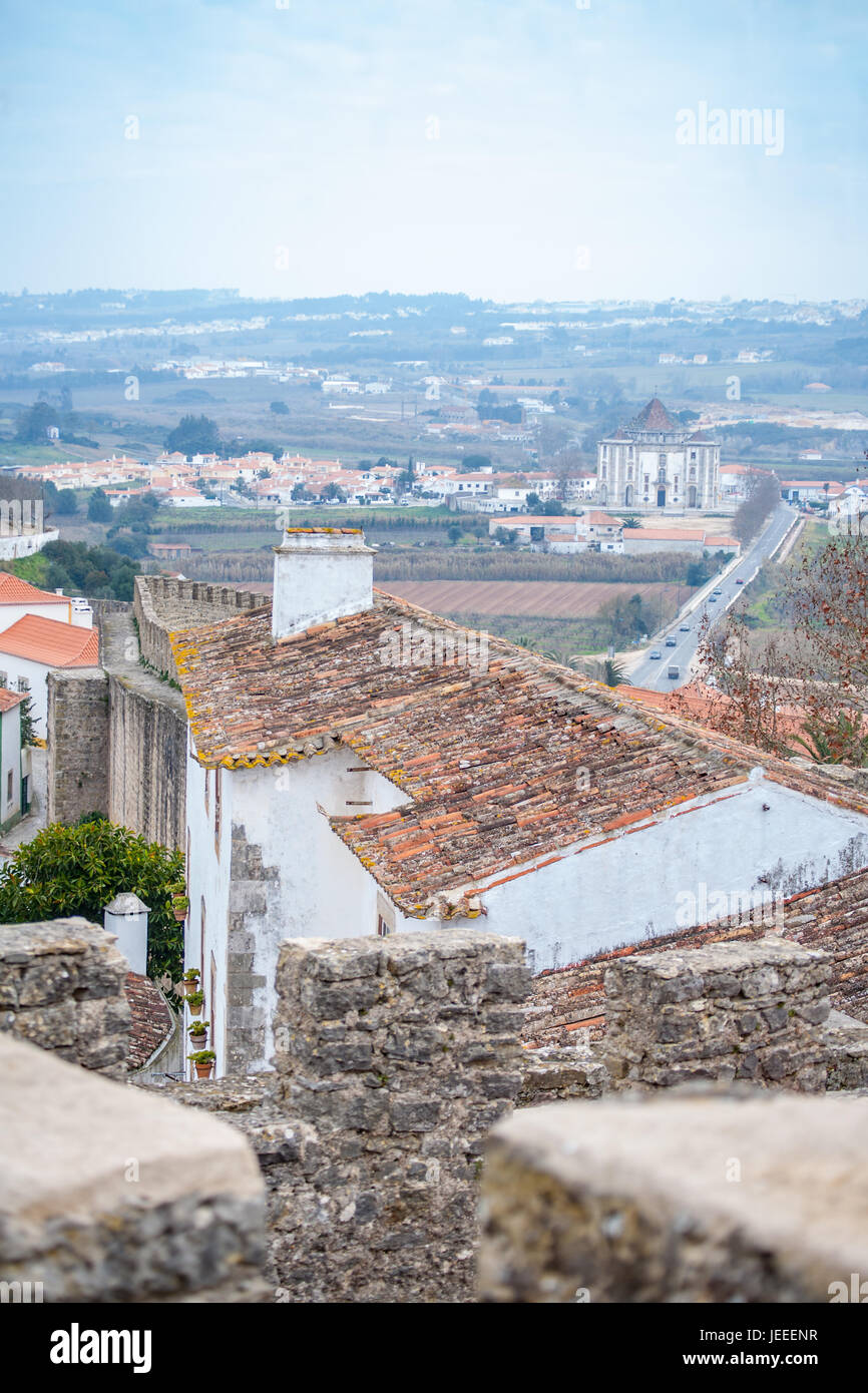 Óbidos is a town and a municipality in the Oeste Subregion in Portugal. with a handful of restaurants, guesthouses and artisan shops.  Obidos is a beautiful and historic walled town that makes for an enjoyable day trip from Lisbon. Stock Photo