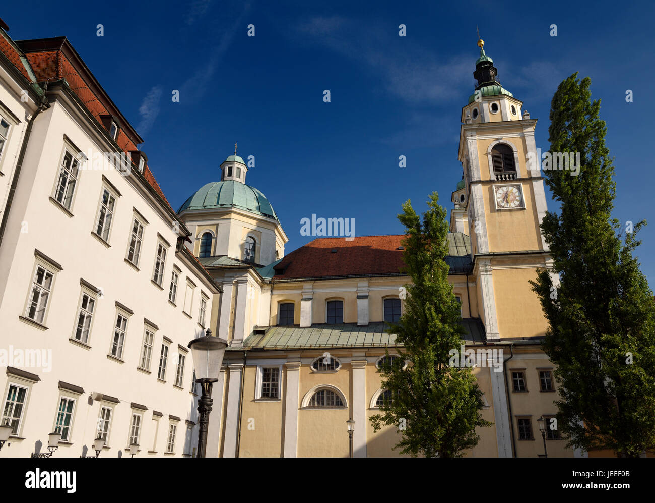 Clock and Bell tower with copper dome of St. Nicholas Catholic 