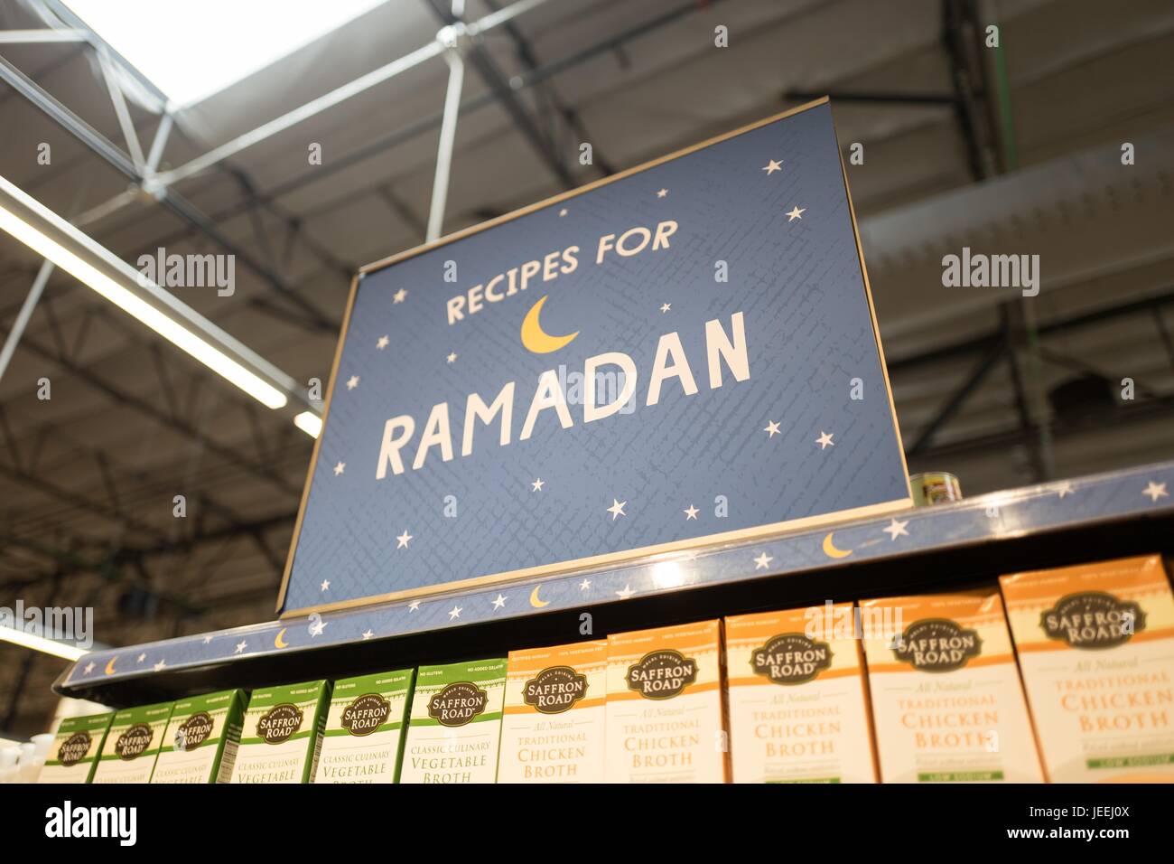 Signage advertising recipes for the Muslim holiday of Ramadan at the Whole Foods Market grocery store in Dublin, California, June 16, 2017. Stock Photo
