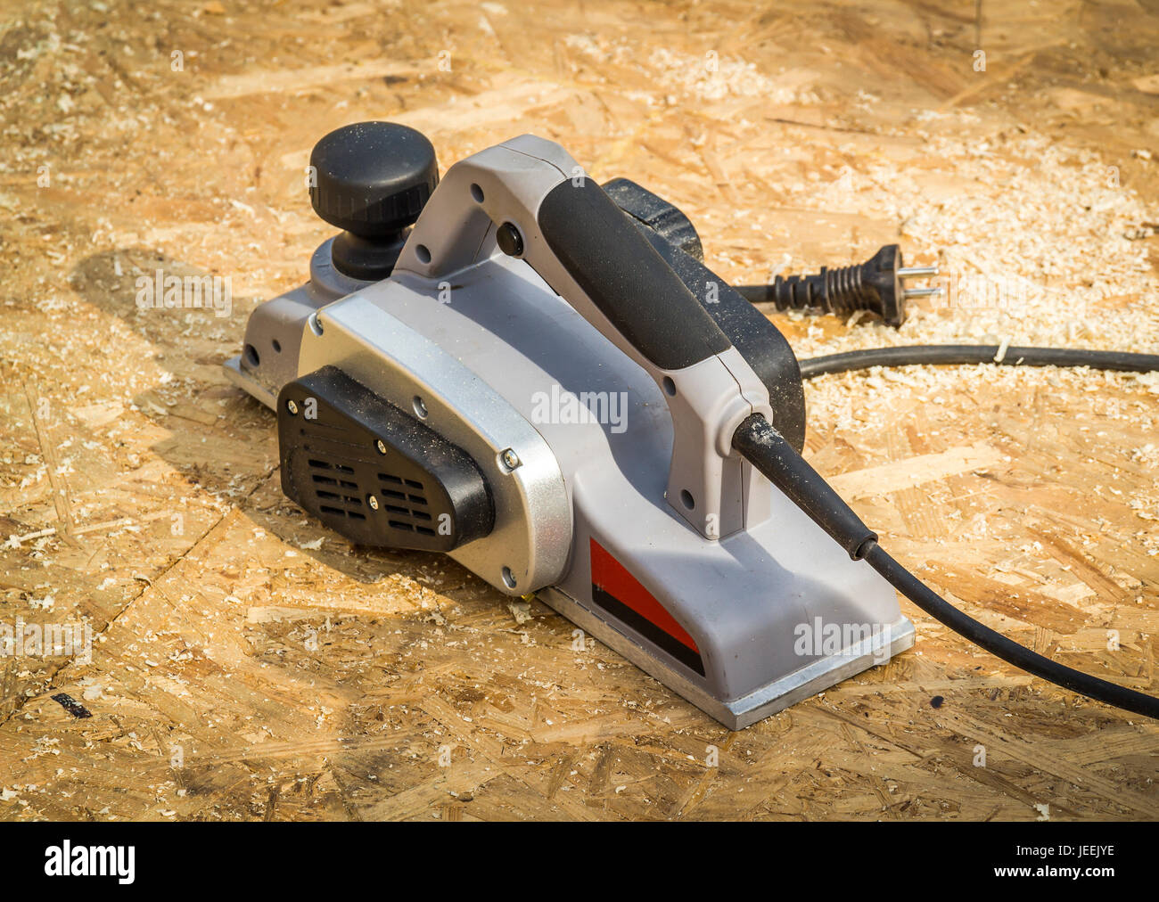 Gray electric planer on a construction site closeup Stock Photo Alamy