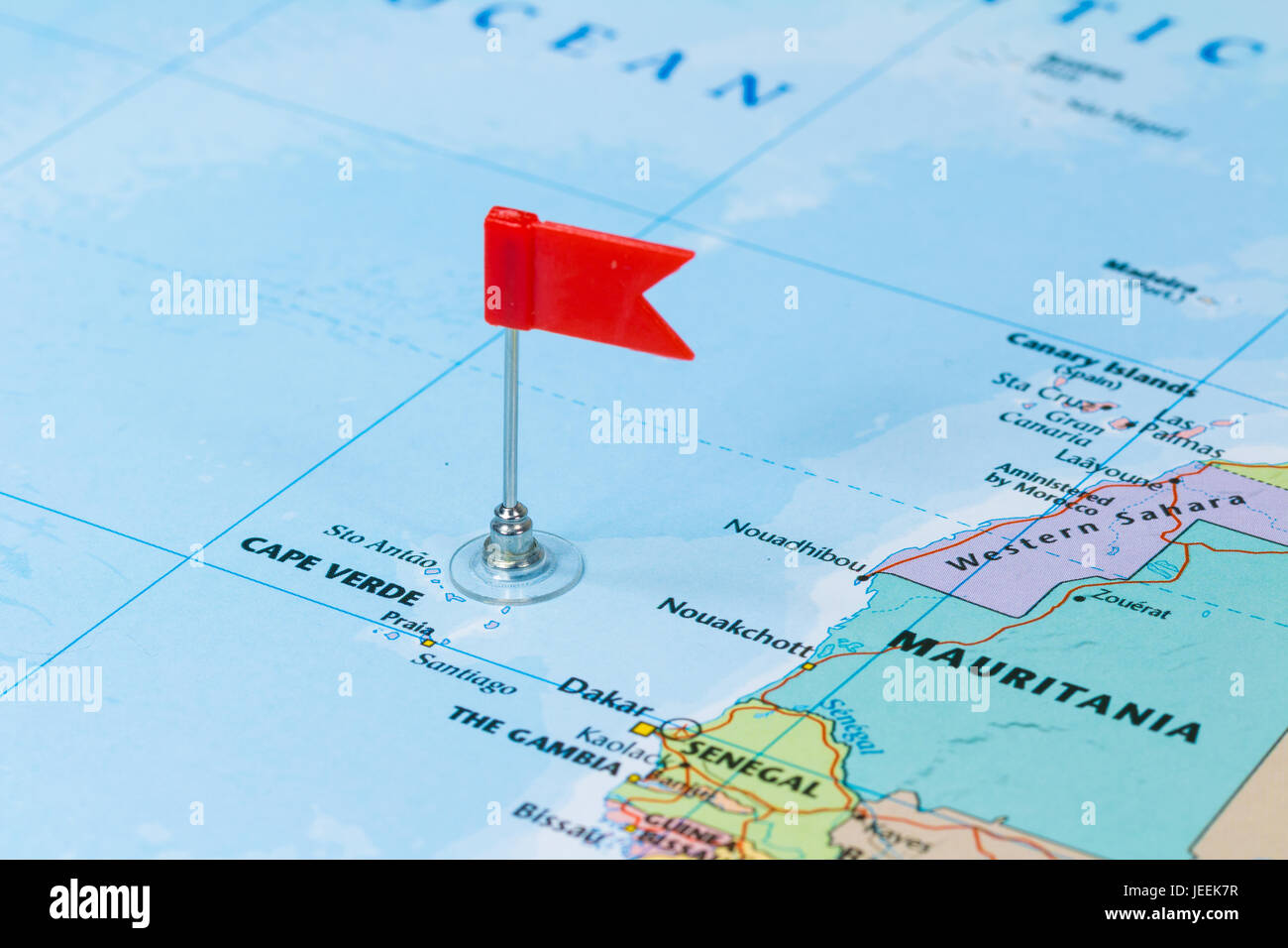 Photo of Cape Verde marked by red flag in holder. Country on African continent. Stock Photo